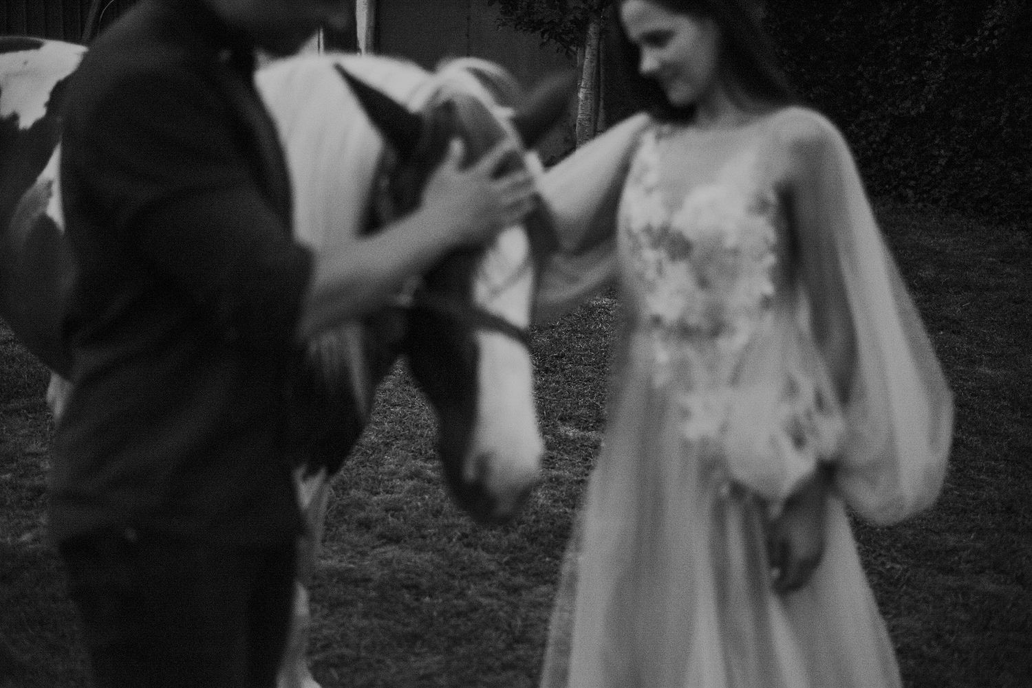 Black and white wedding photo sequence showing couple dancing together outdoors in romantic embrace.