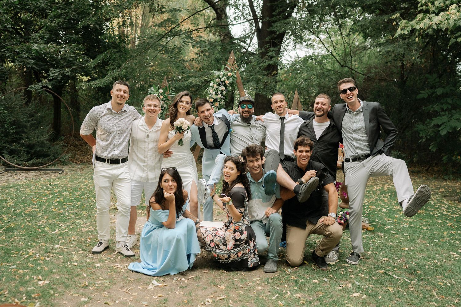 A series of outdoor family photo sessions showing groups sitting together on grass in a park setting.