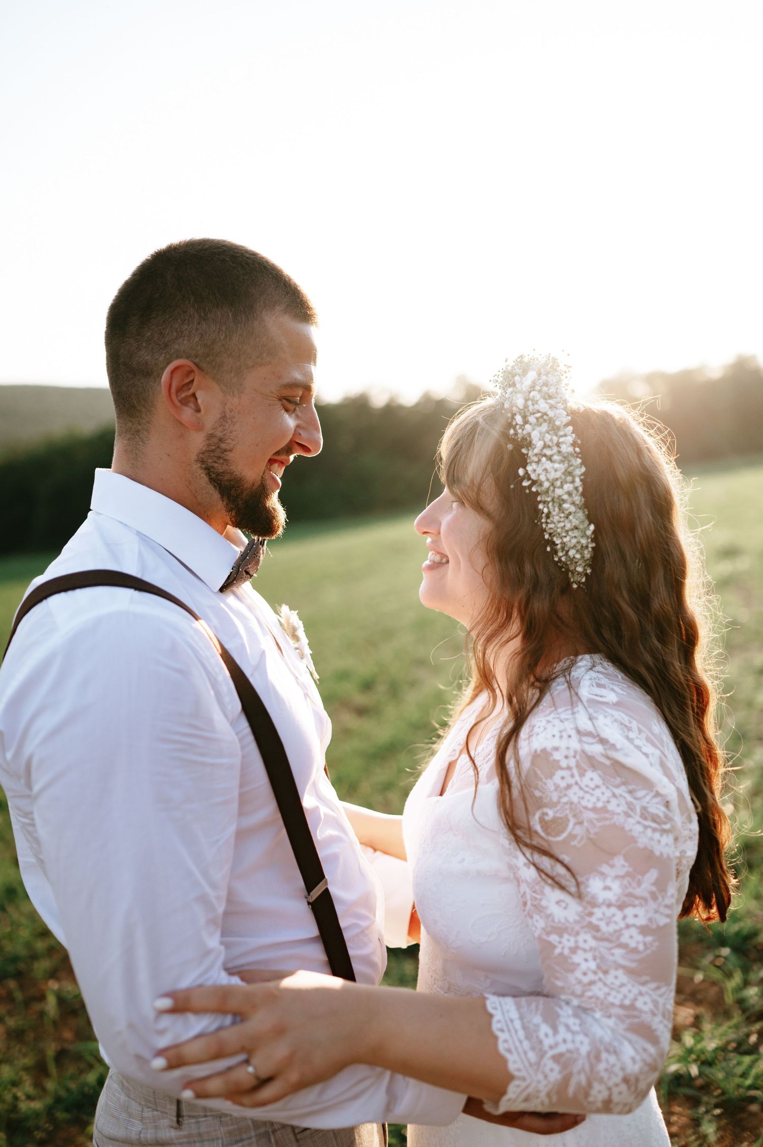 A playful wedding portrait sequence showing the couple's natural chemistry in golden sunlight.