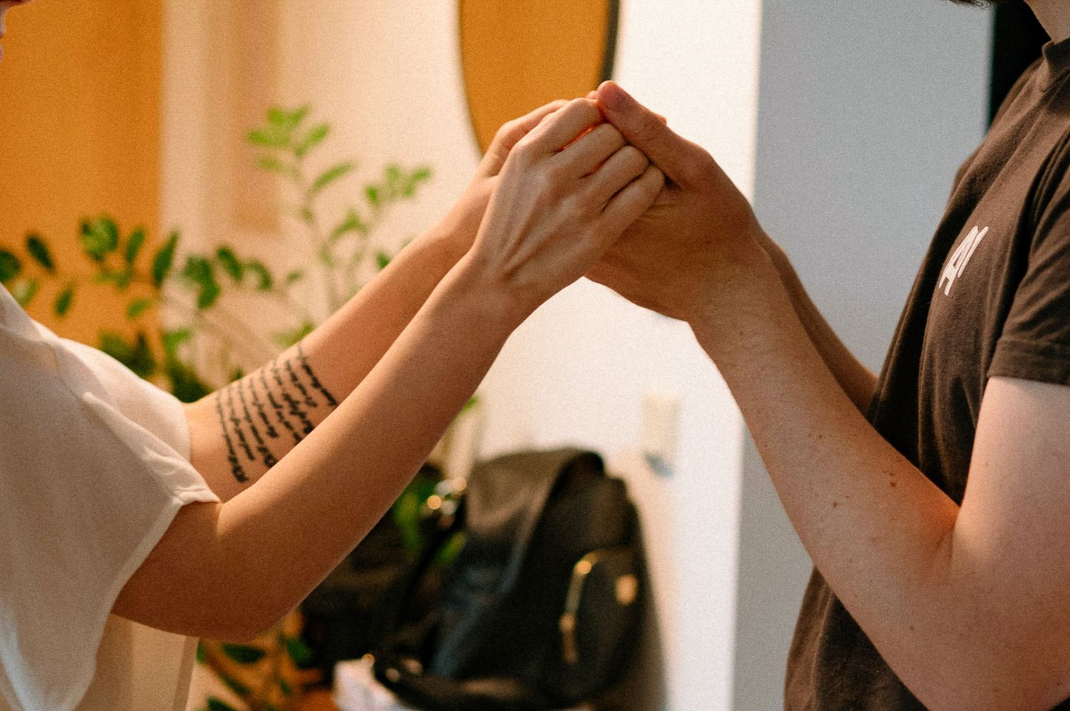 Close-up shots of hands and gestures during an intimate moment.