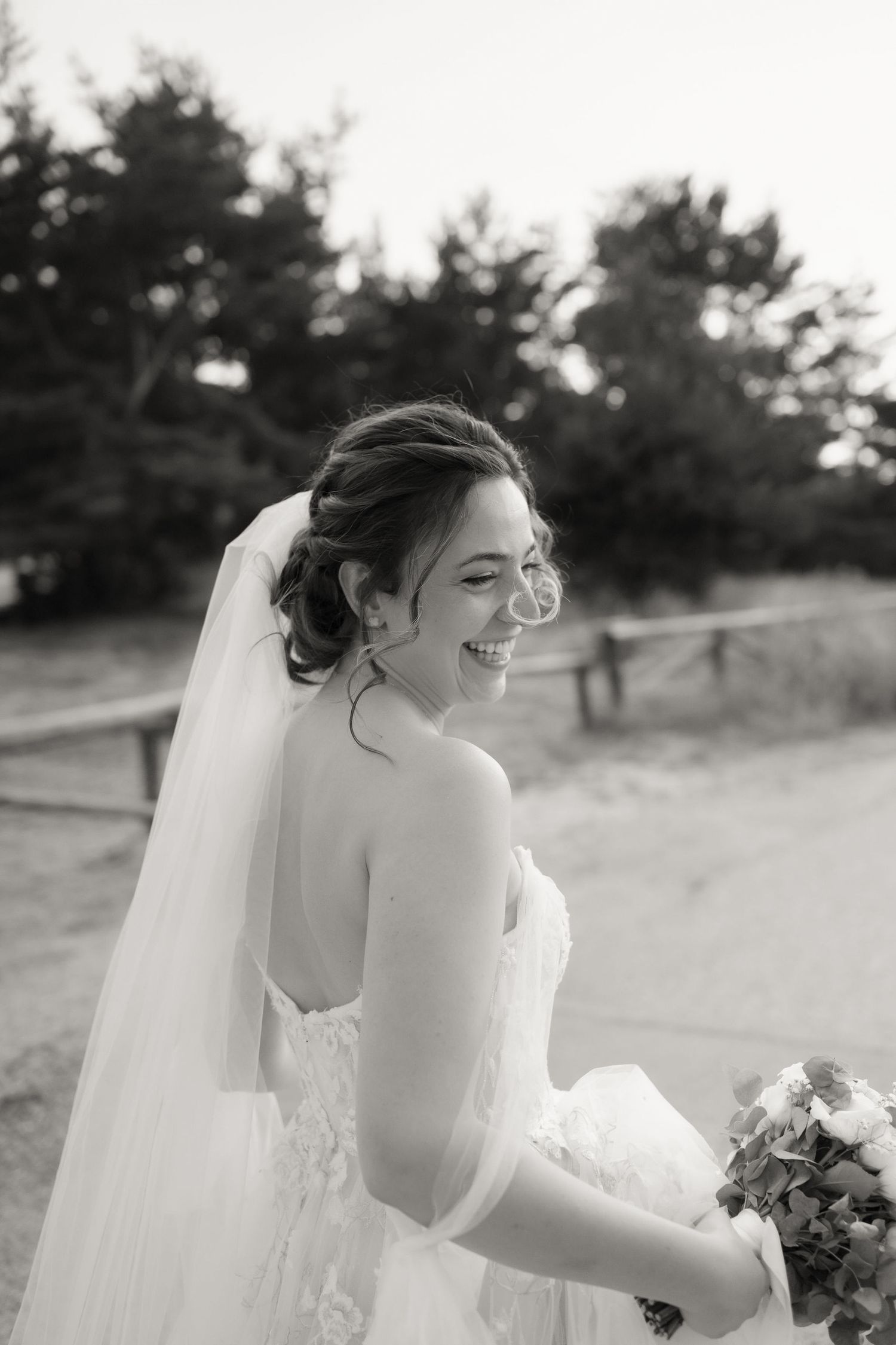 Black and white photo series of a bride in a strapless wedding dress holding a bouquet in an outdoor setting.