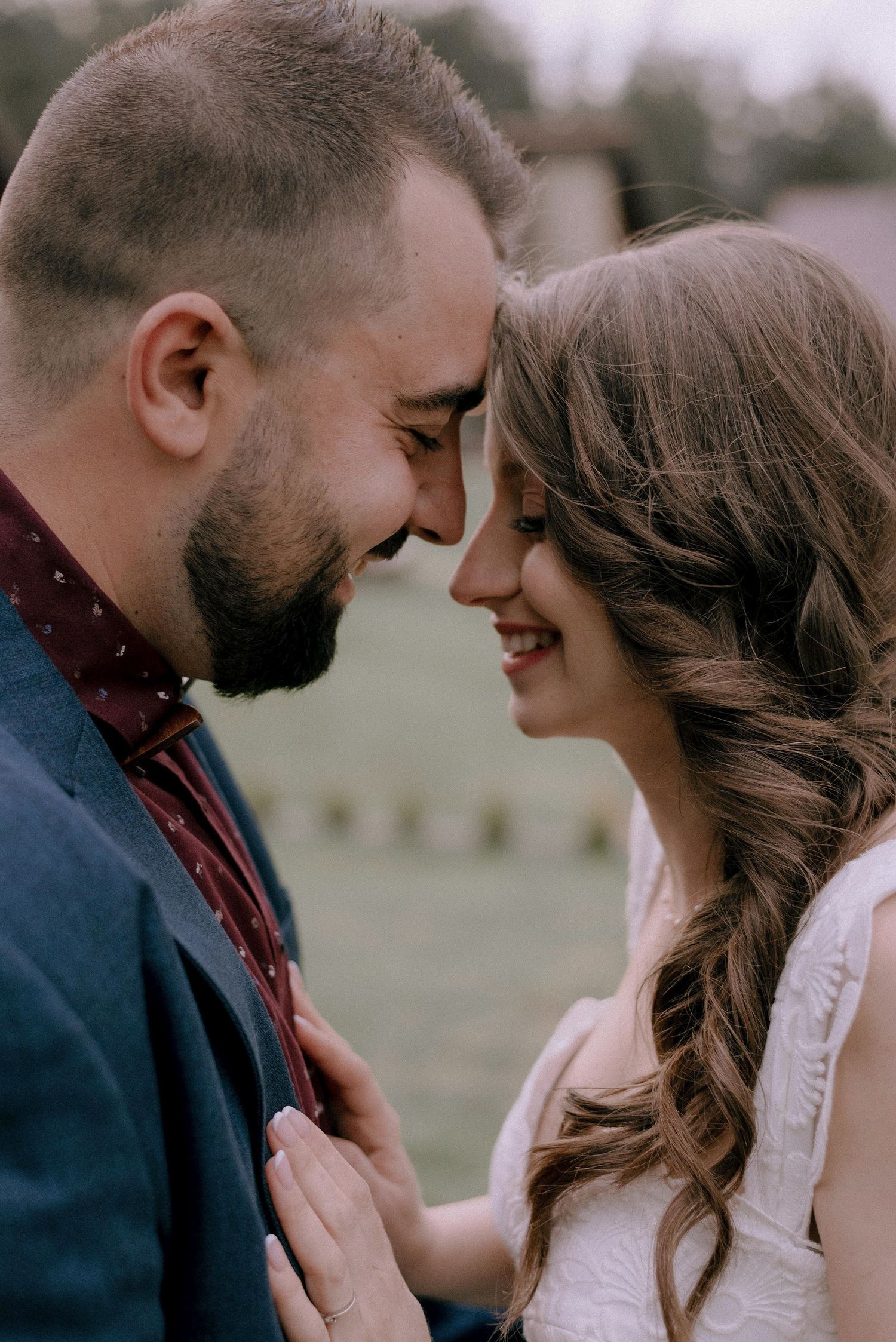 A romantic close-up moment between a couple on their wedding day.