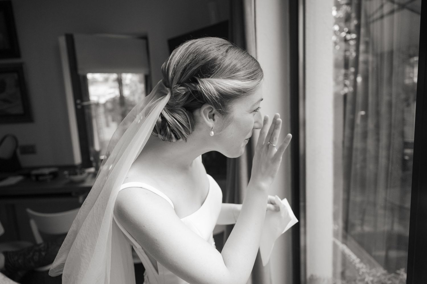 A series of candid wedding moments showing a bride in white dress getting ready and celebrating.