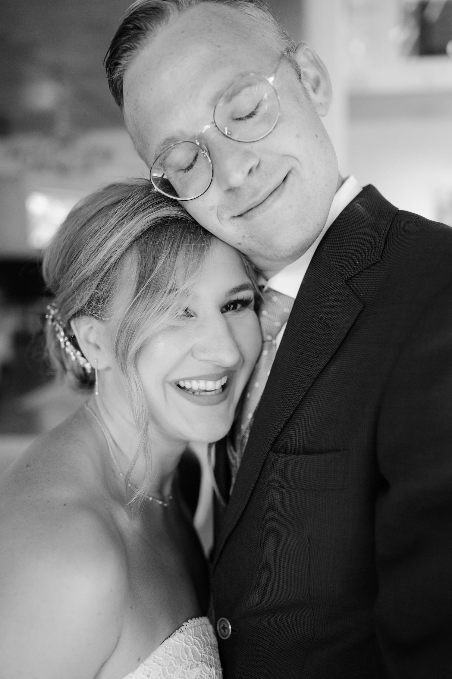 A series of black and white photos showing tender moments between newlyweds.