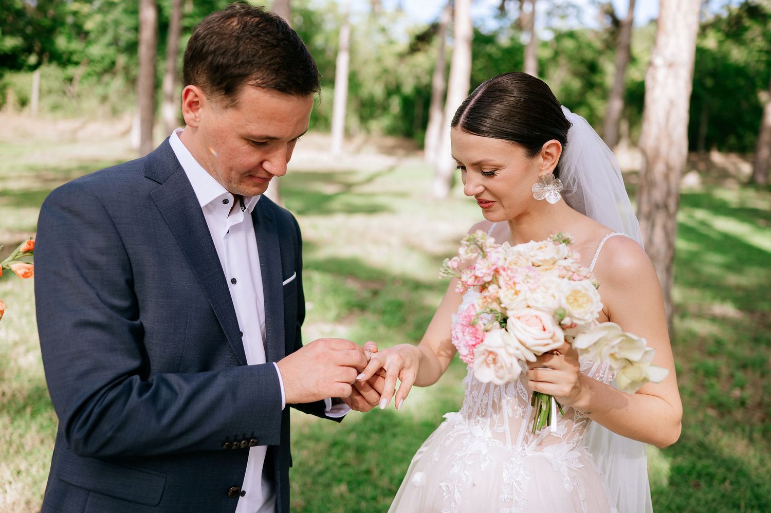 Intimate wedding moments captured in a series of photos under tall pine trees.