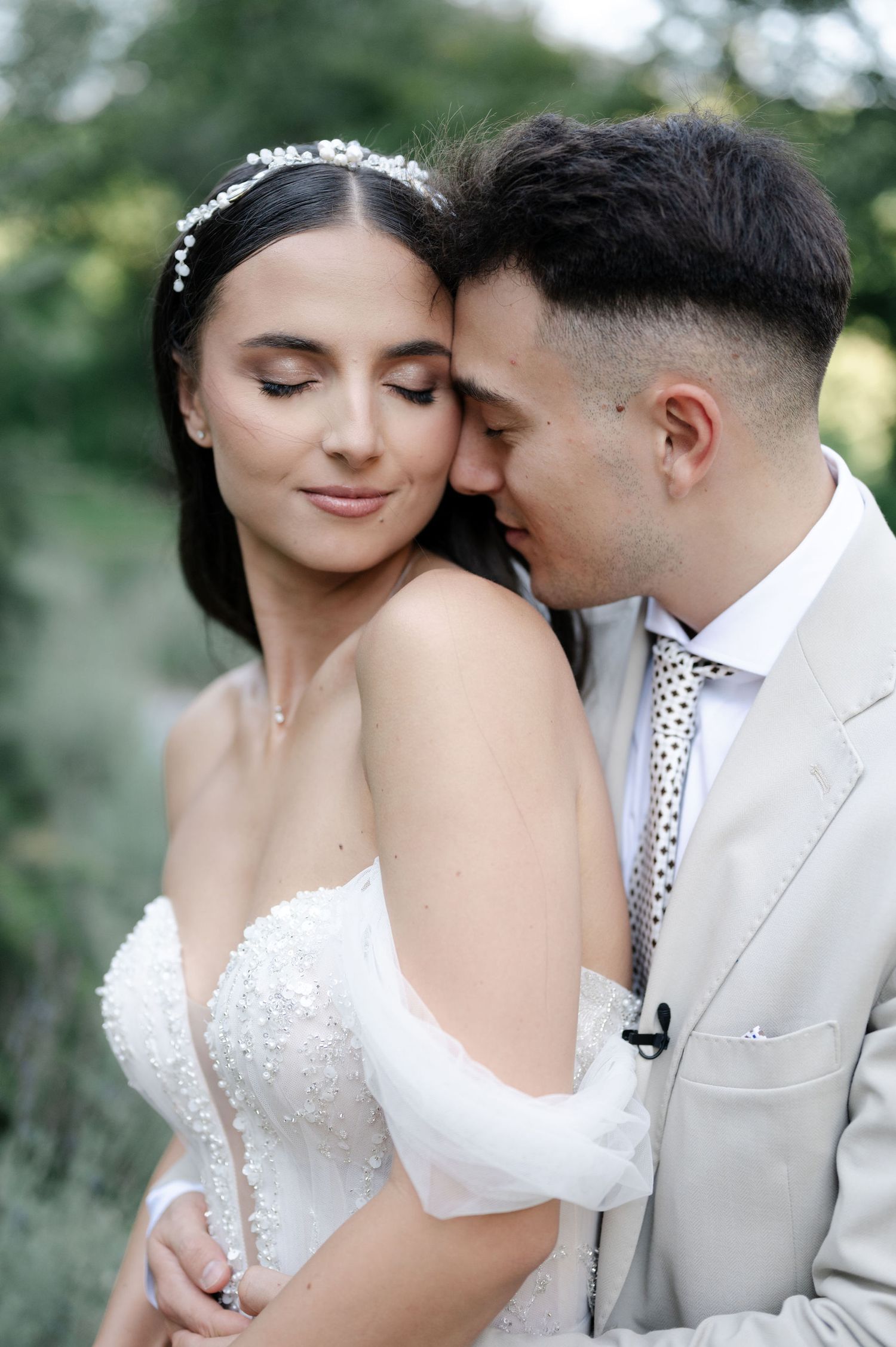 Romantic sequence of wedding photos capturing tender moments in a garden setting.
