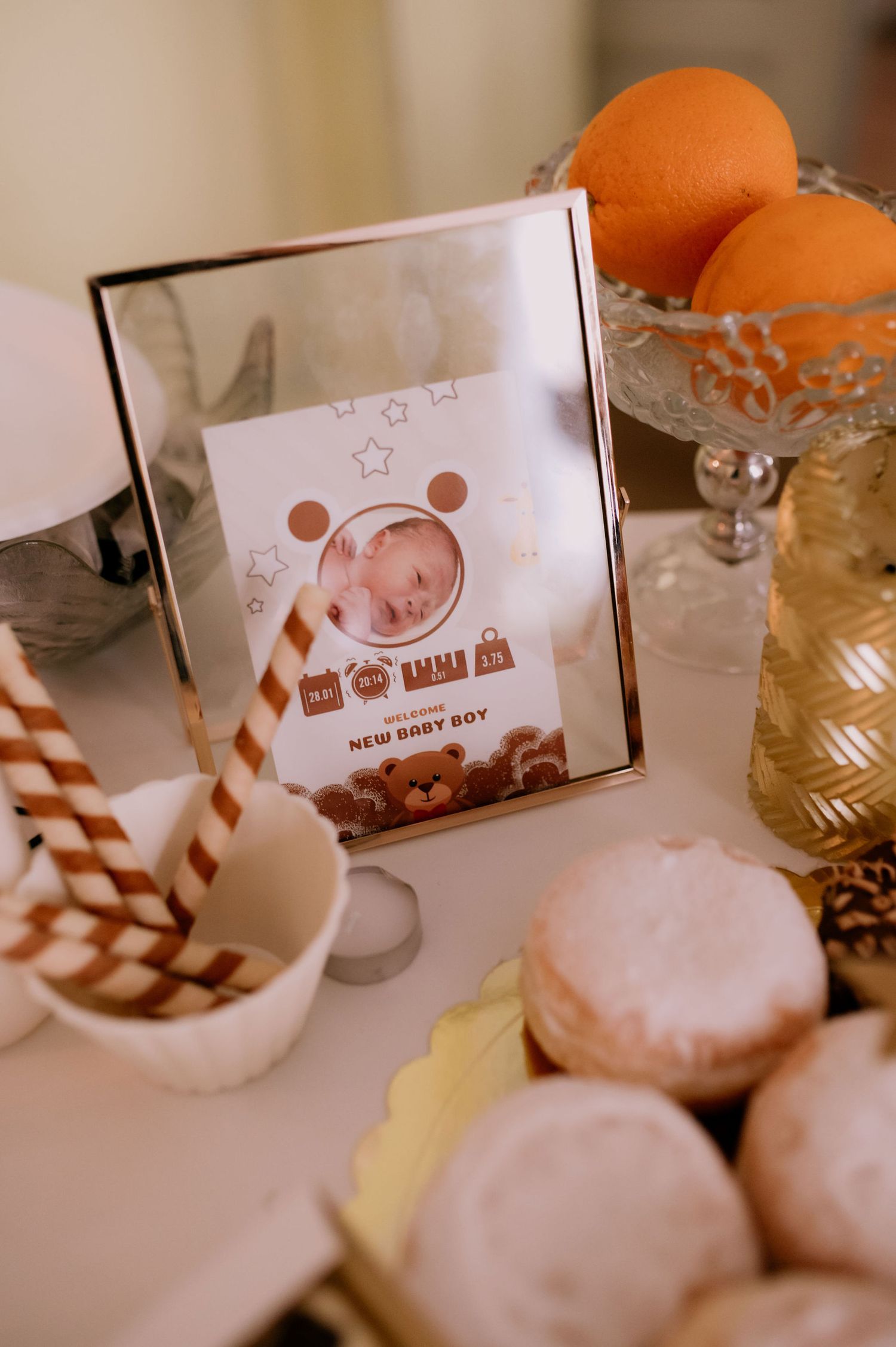 Warm-toned photo series showing oranges, cookies, and decorative cards arranged on a white surface in soft lighting.
