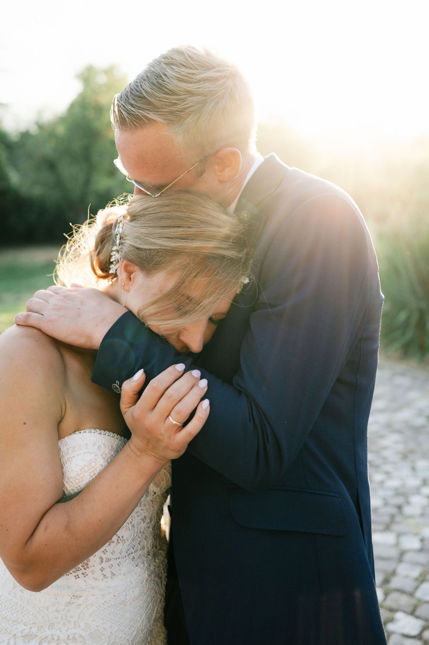 Emotional wedding sequence capturing tender moments in warm evening light.