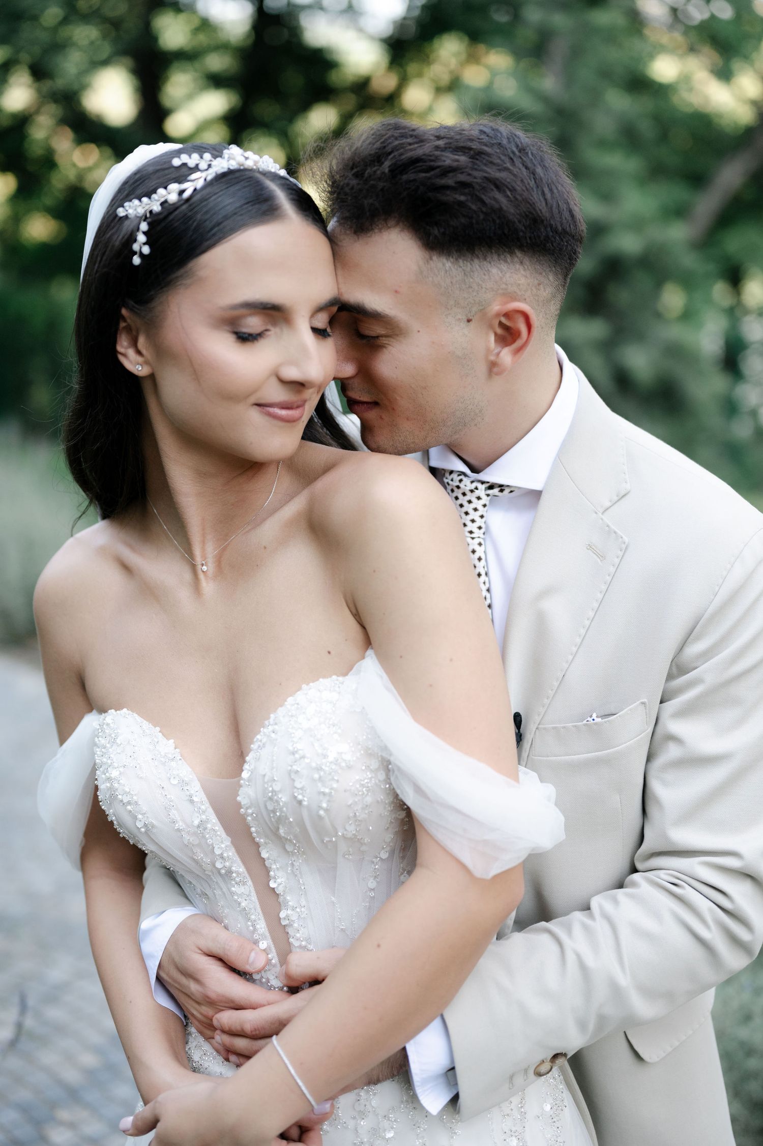 Romantic wedding photography sequence showing tender moments between newlyweds in a garden setting.