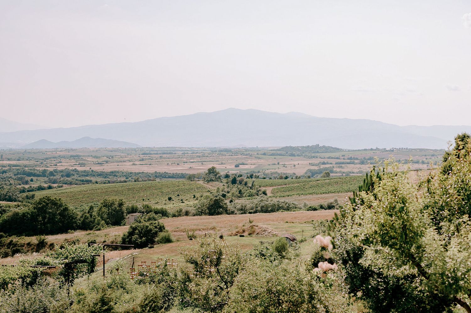 Scenic mountain vista with expansive views of rolling hills and distant landscapes.