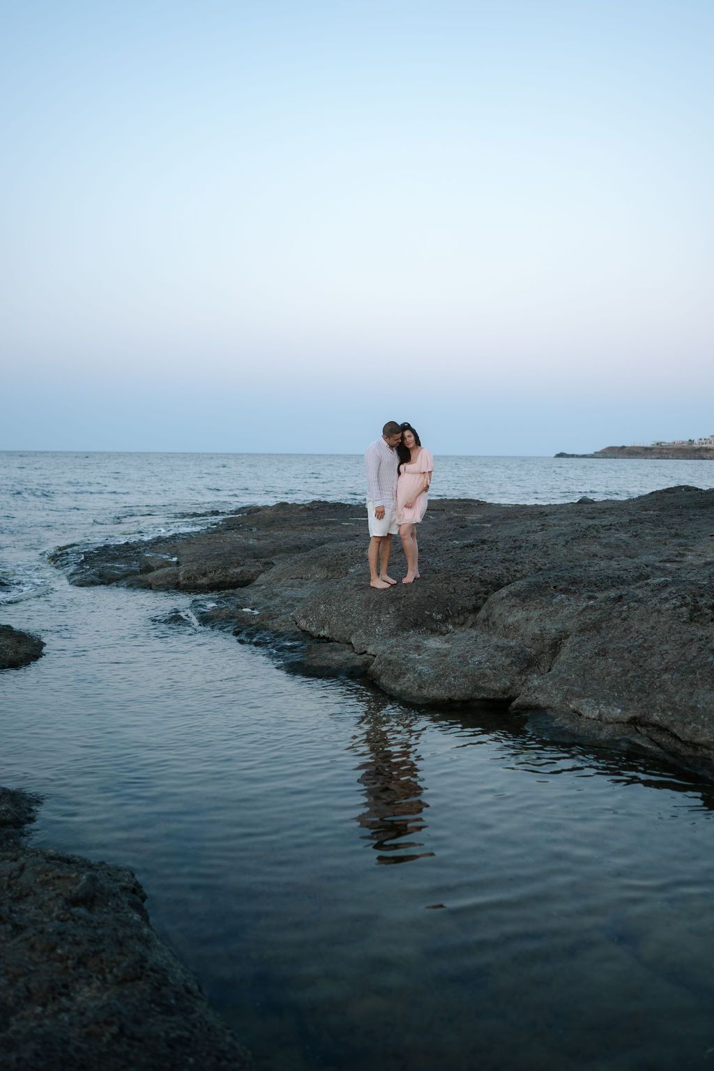 A series of coastal landscape photos showing a rocky shoreline against a misty ocean horizon at dusk.