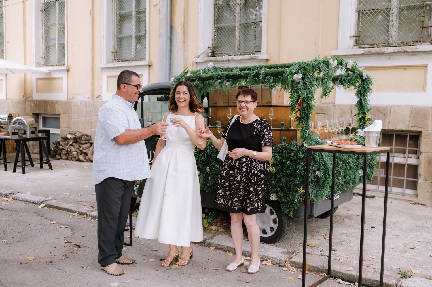 A series of candid outdoor wedding photos showing guests and couples interacting at a garden venue.