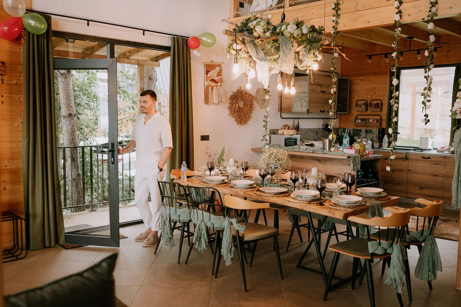 Rustic wedding reception venue with wooden walls and elegant table settings.