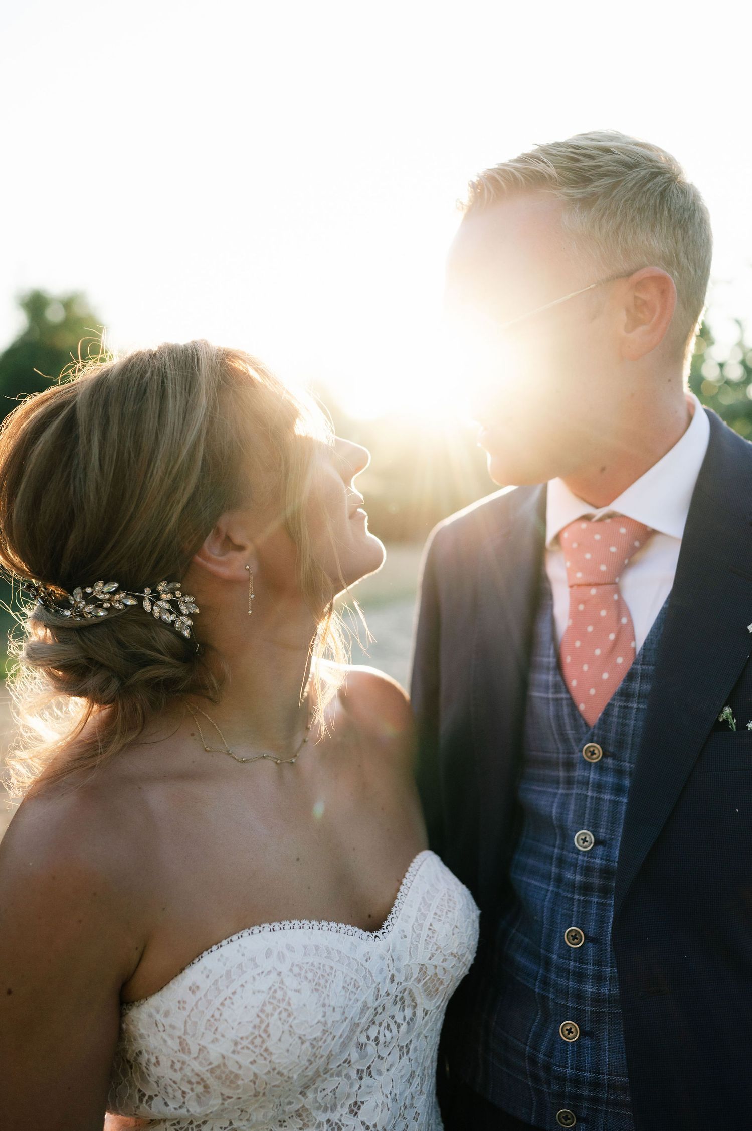 Candid wedding sequence showing joyful interactions in sunlit setting.