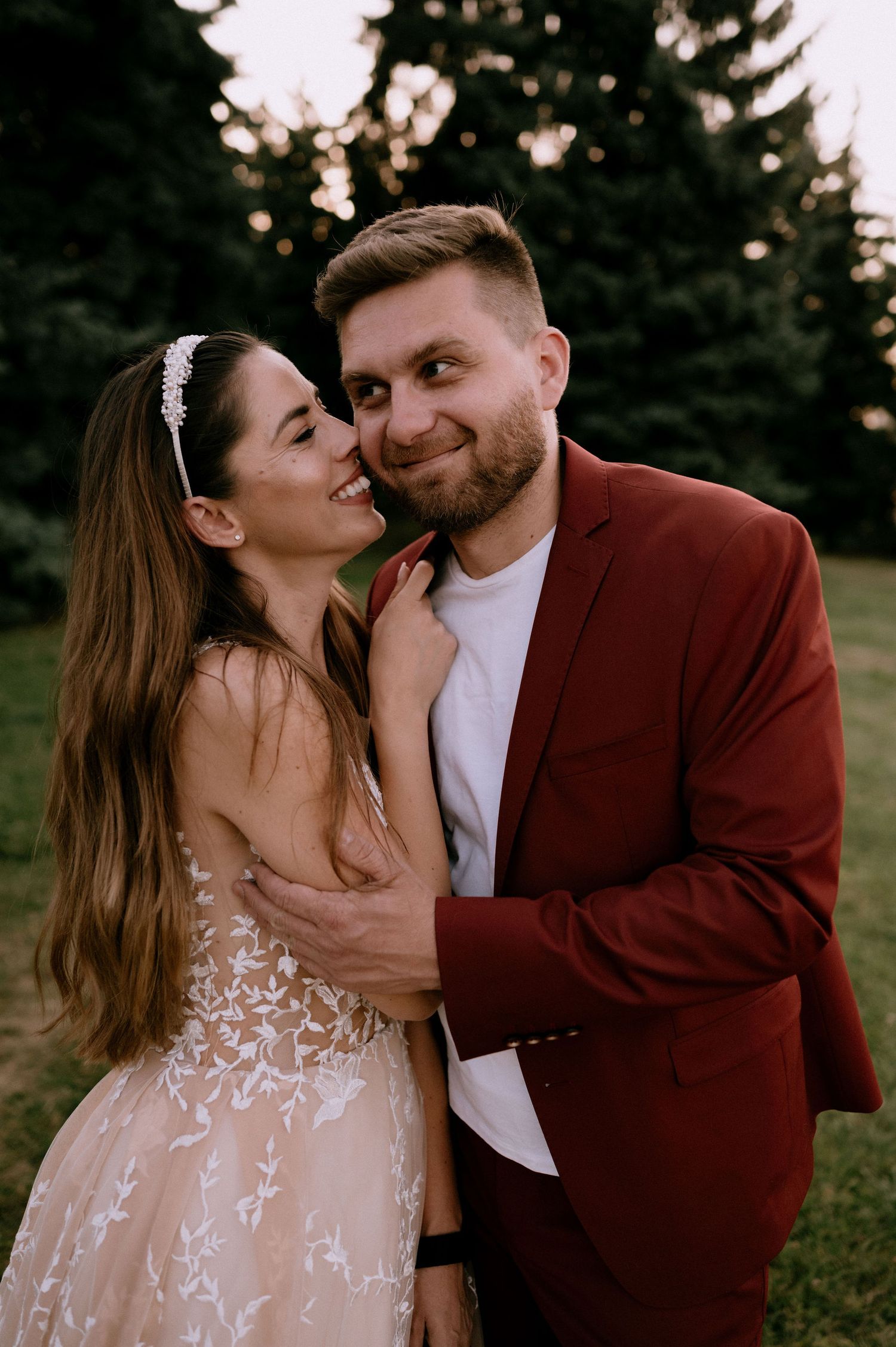 Intimate wedding portraits showing affectionate moments between newlyweds.