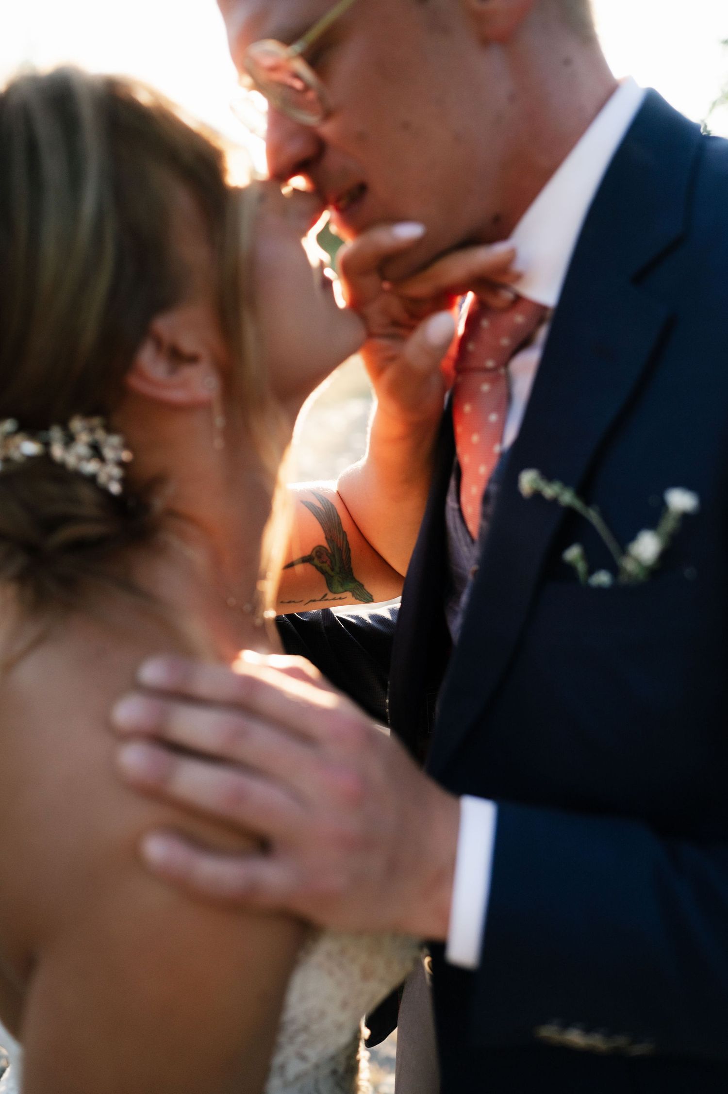 Close-up sequence of romantic wedding couple during sunset photo session.