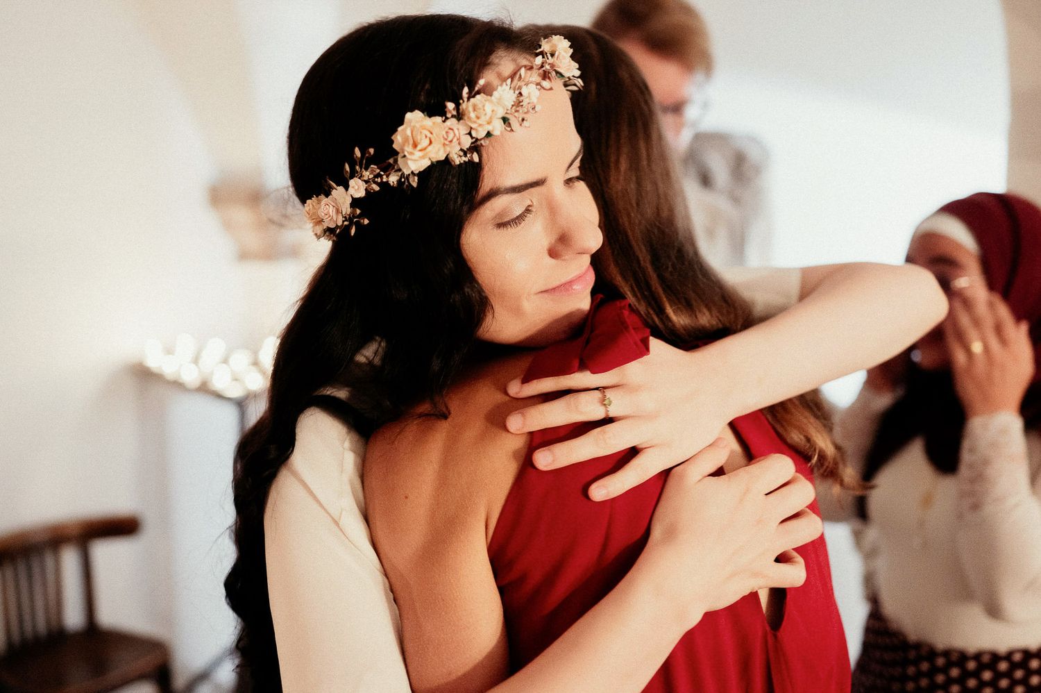 Intimate embrace captured in a series of candid moments with soft lighting.