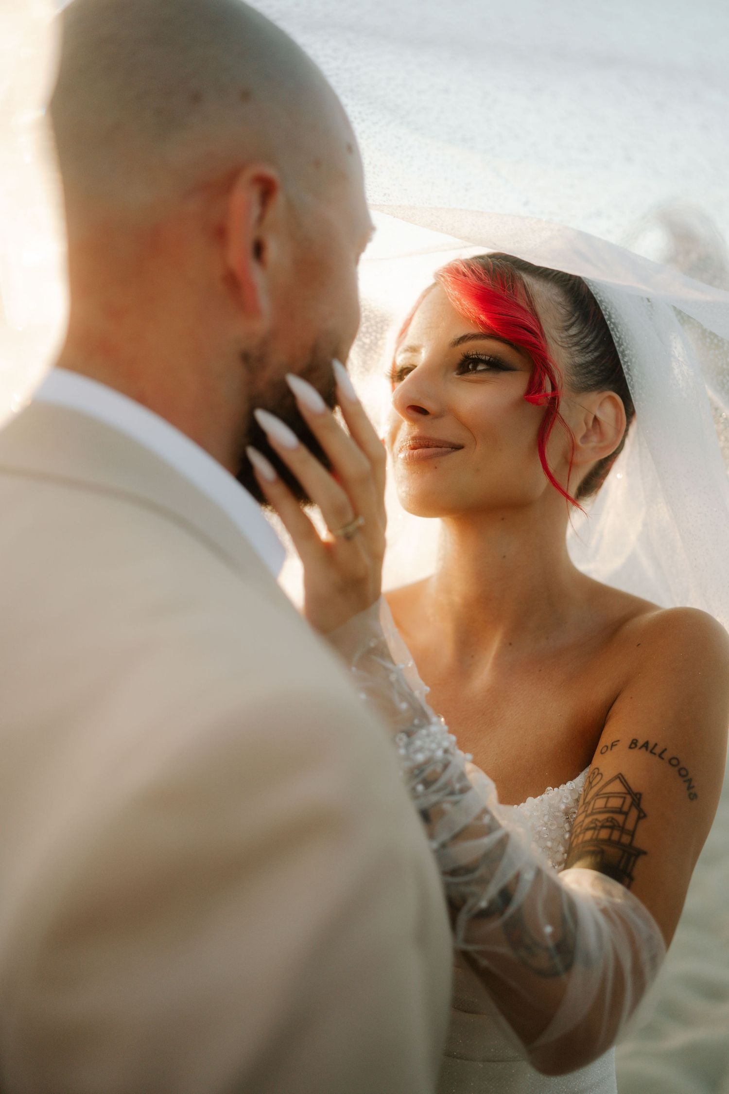 A romantic wedding couple shares intimate moments at sunset in a series of candid photographs.