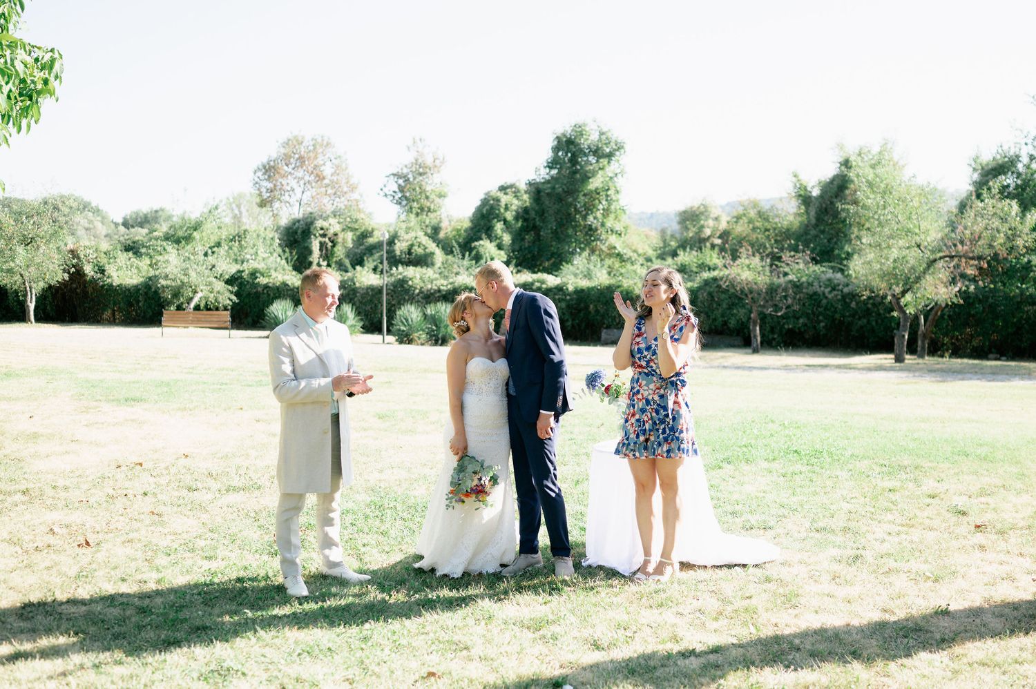 Wedding celebration candid moments captured in a series of outdoor photos on a sunny day.