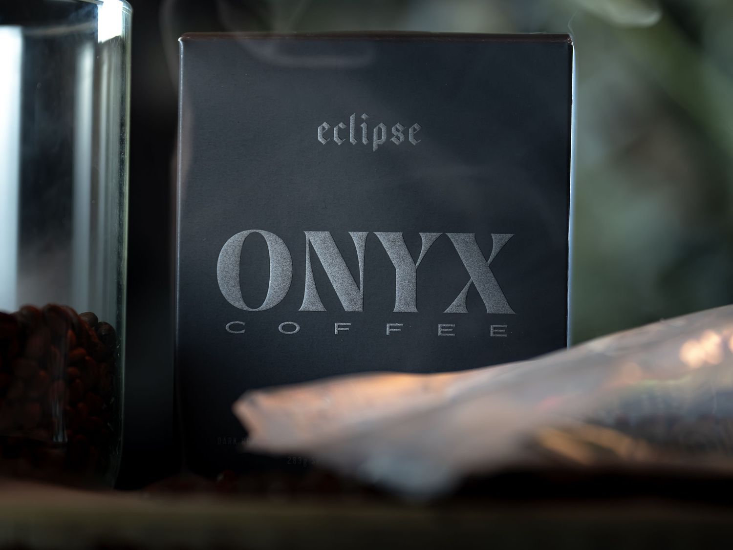 Onyx Coffee Eclipse blend box displayed in moody, dark lighting showcasing premium specialty coffee branding.