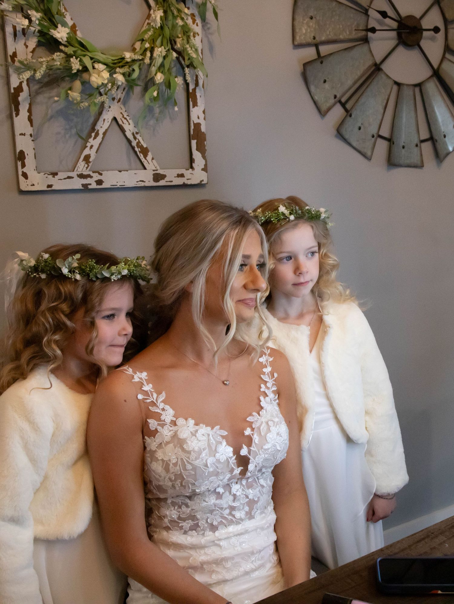 Wedding scene with floral decorations and rustic farmhouse decor.