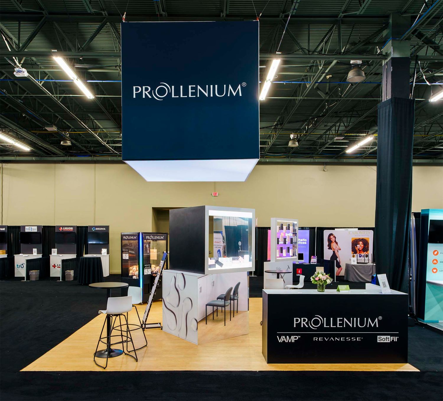 Trade show floor layout featuring modern display booths and professional lighting setup.