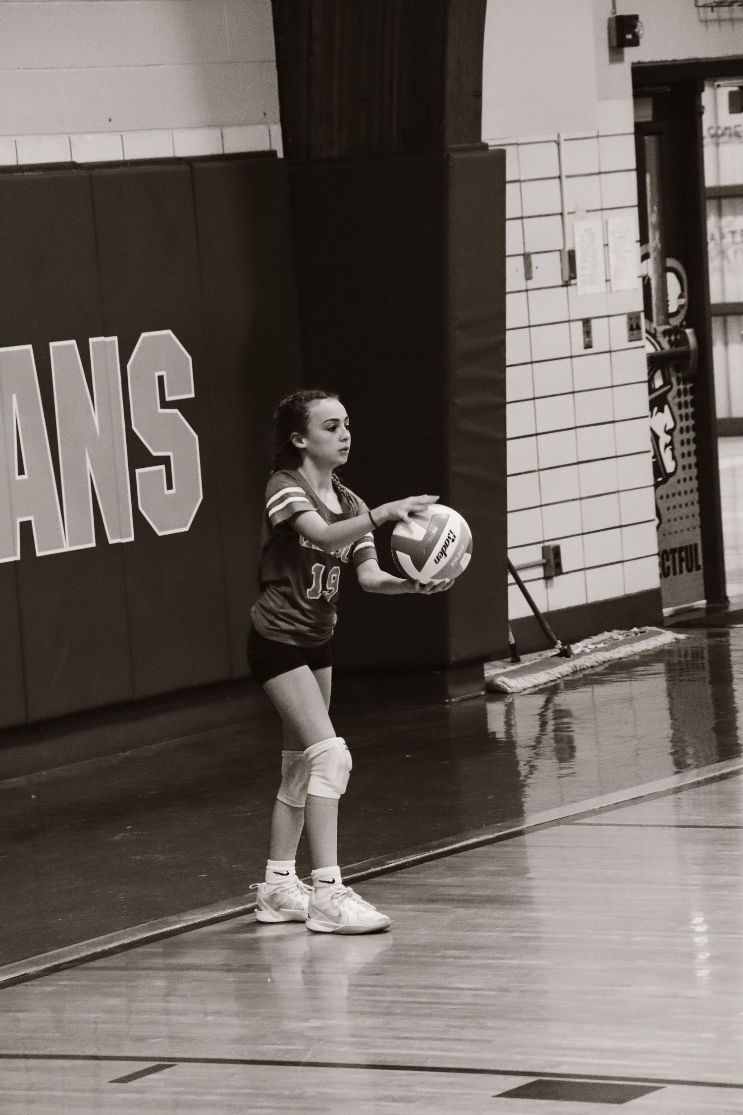 Getting ready to serve volleyball four.