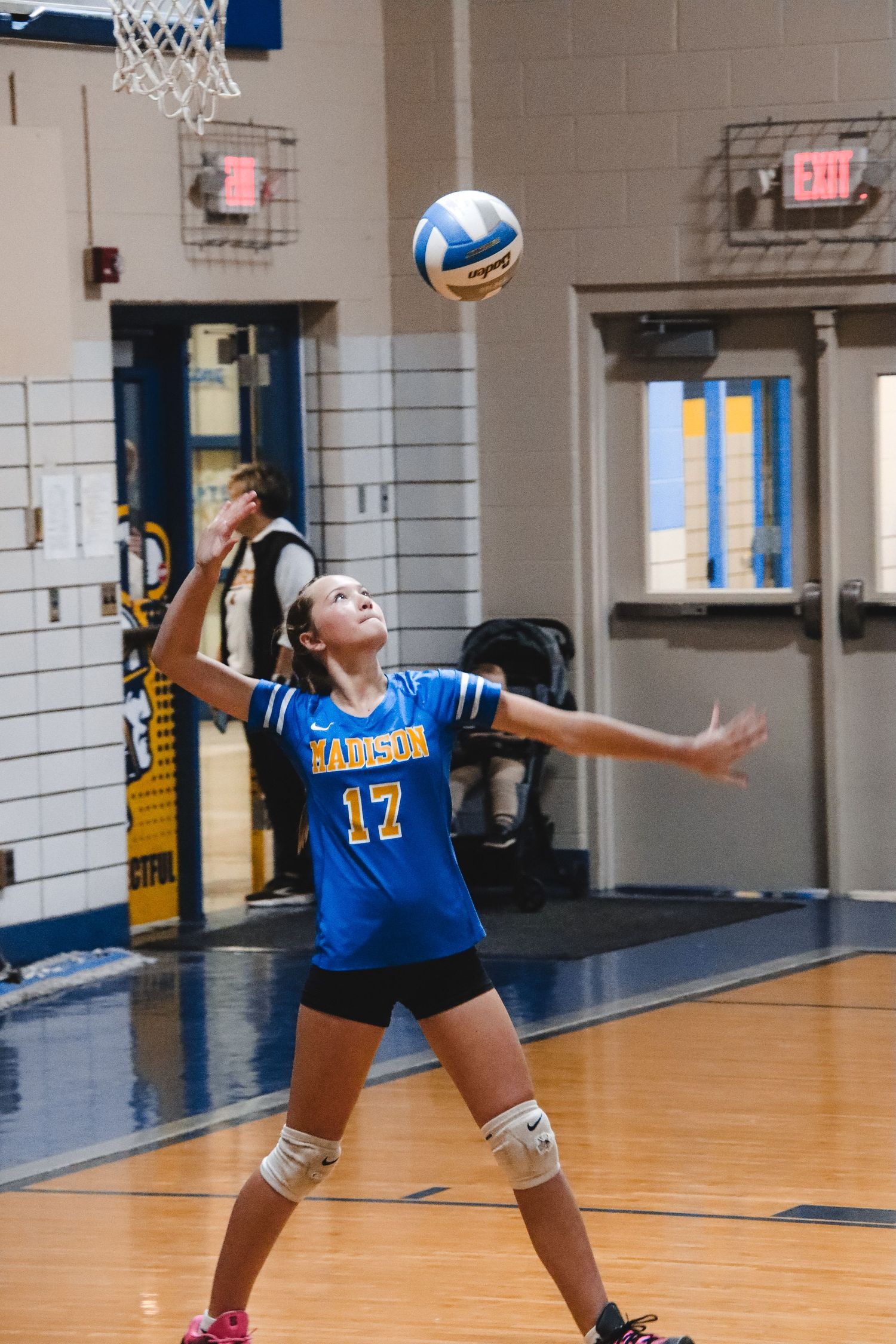 Serving the volleyball one.