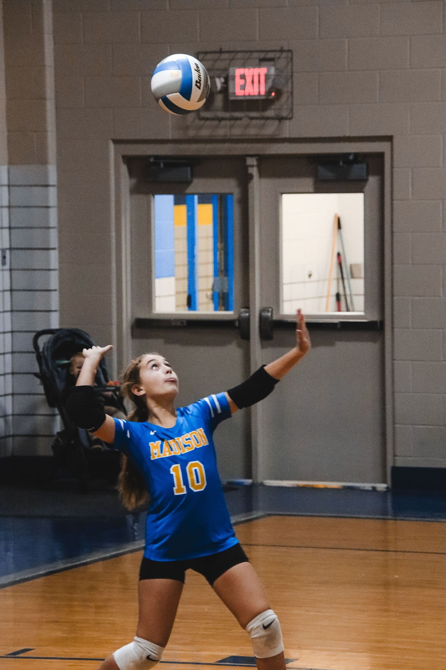 Serving the volleyball three.