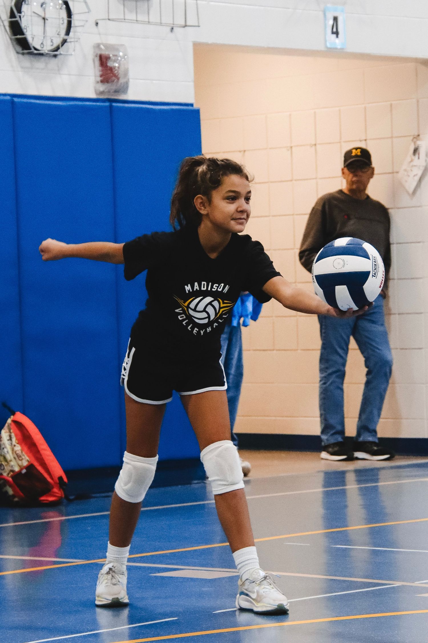 Serving the volleyball six.