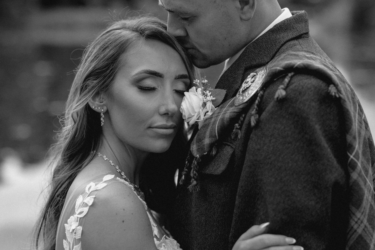 Romantic black and white wedding photo collage showing intimate moments between bride and groom in outdoor setting.