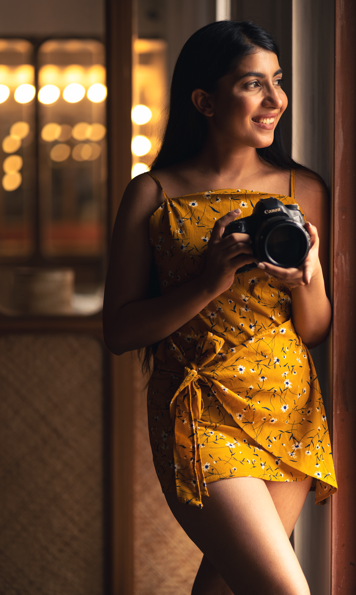 Fashion editorial with professional posing and artistic lighting.