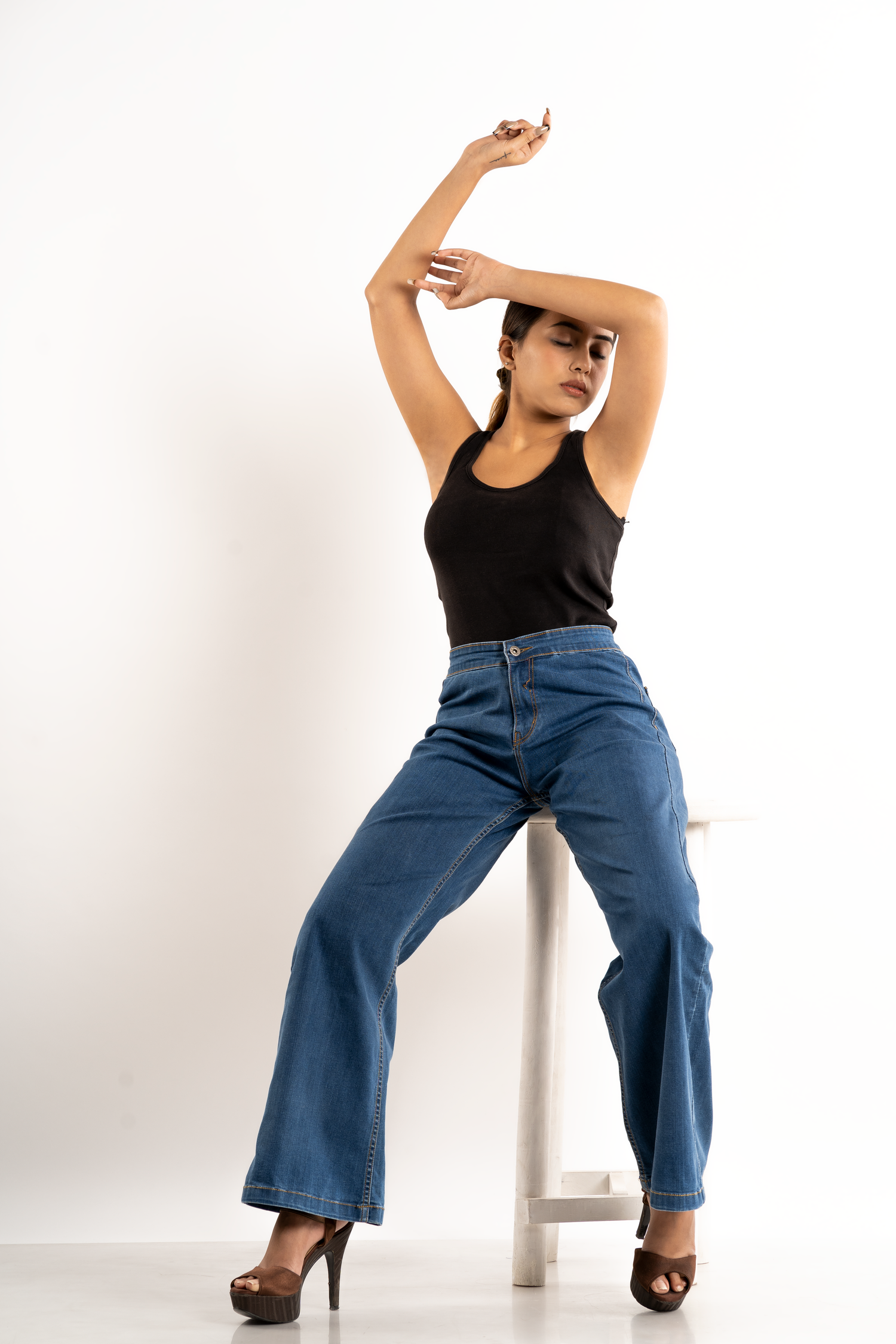 Premium fashion campaign image showcasing timeless style and elegance.