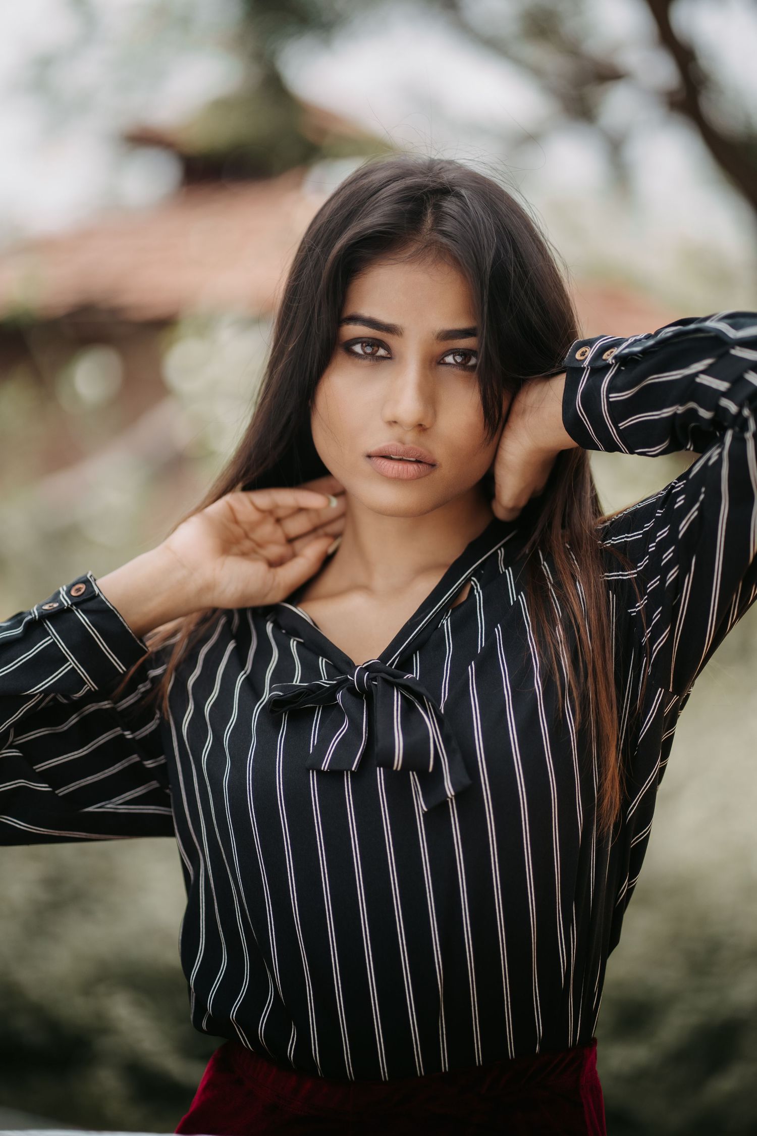 Luxury fashion portrait captured in a professional photography studio.