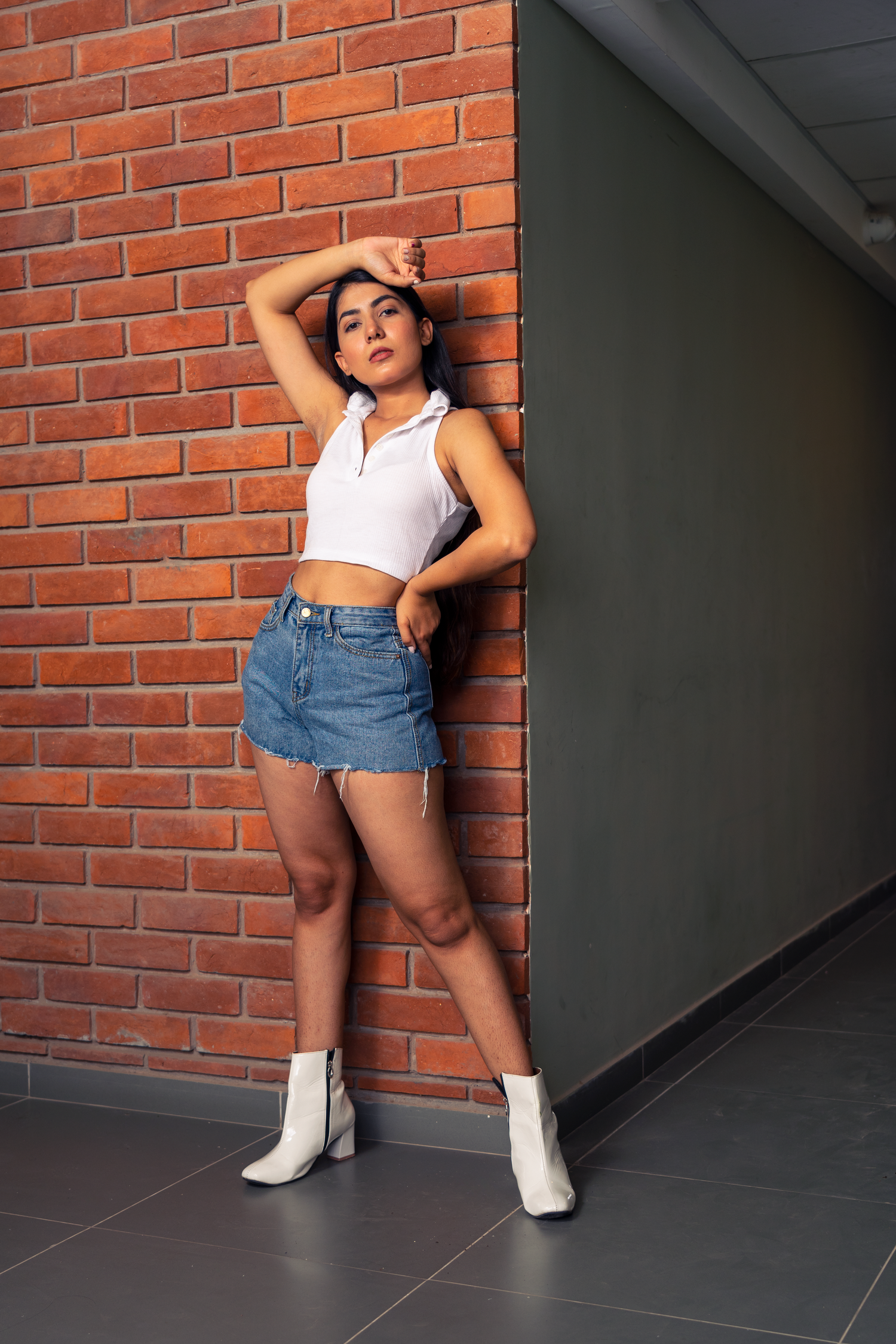Outdoor model photoshoot with elegant styling and natural lighting.