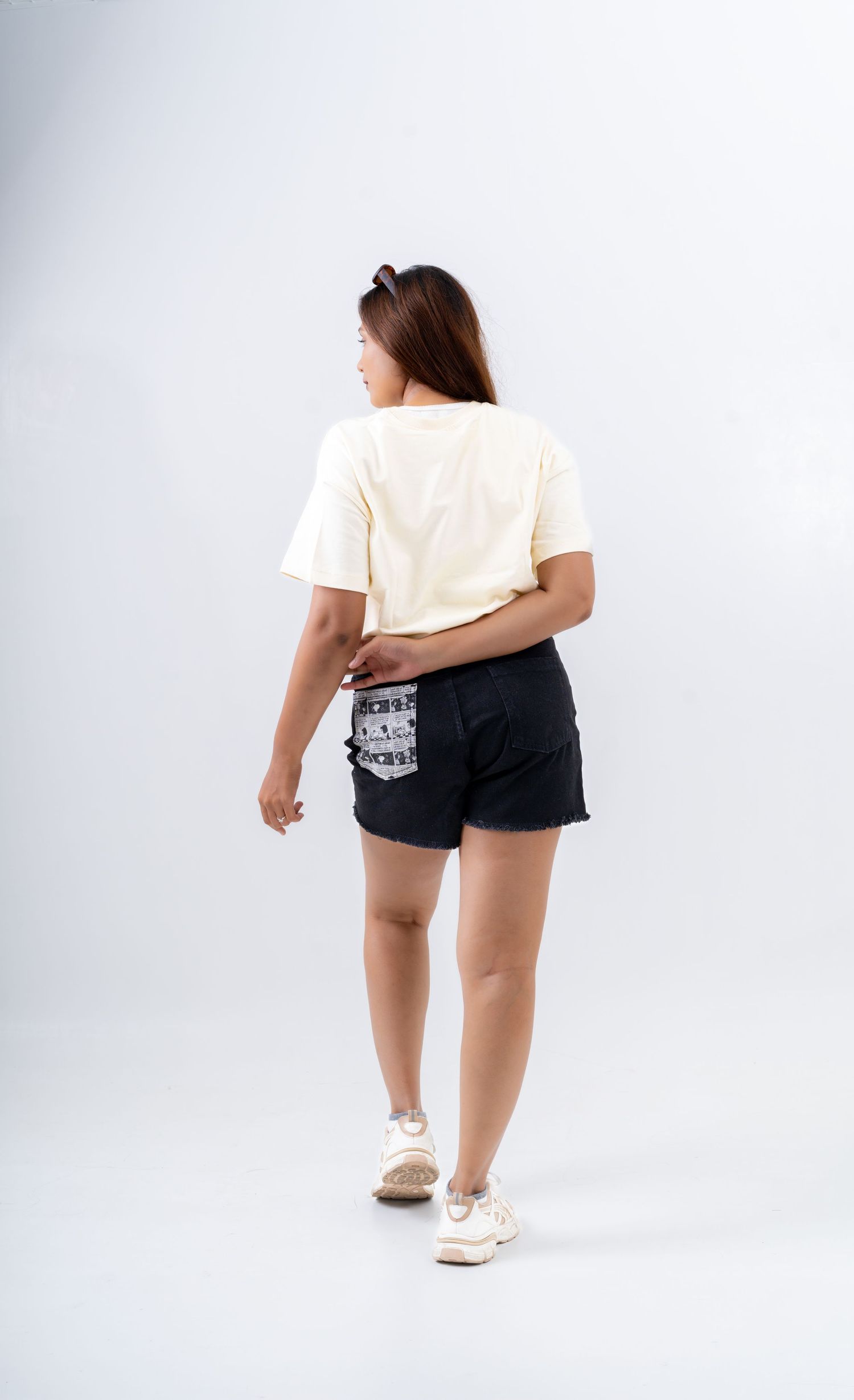 Oversized T-shirt fashion photography for Souled Store by FramesbyDarshil, photographed in a clean studio setting.