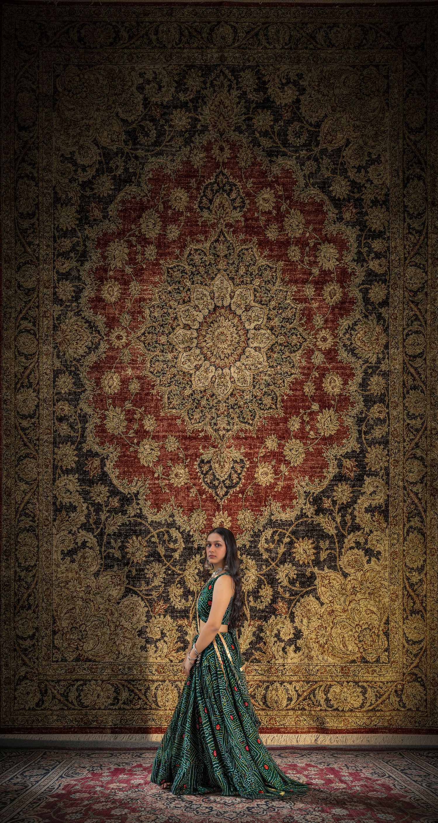 Luxury fashion editorial featuring a model wearing a designer embroidered Chaniya Choli, photographed by Frames by Darshil.