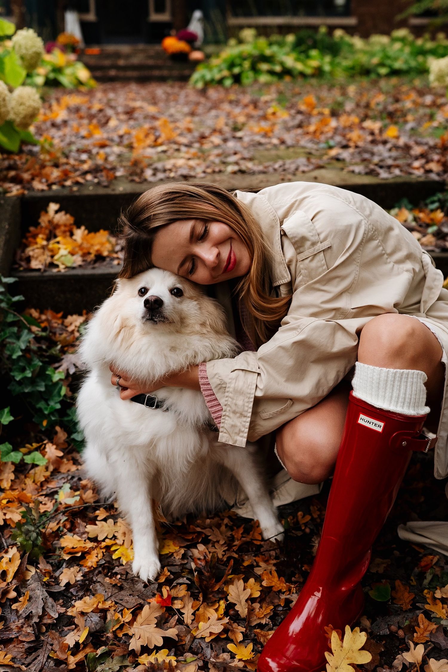 Doggie looking up at its owner during a portrait session in Heritage Hill.