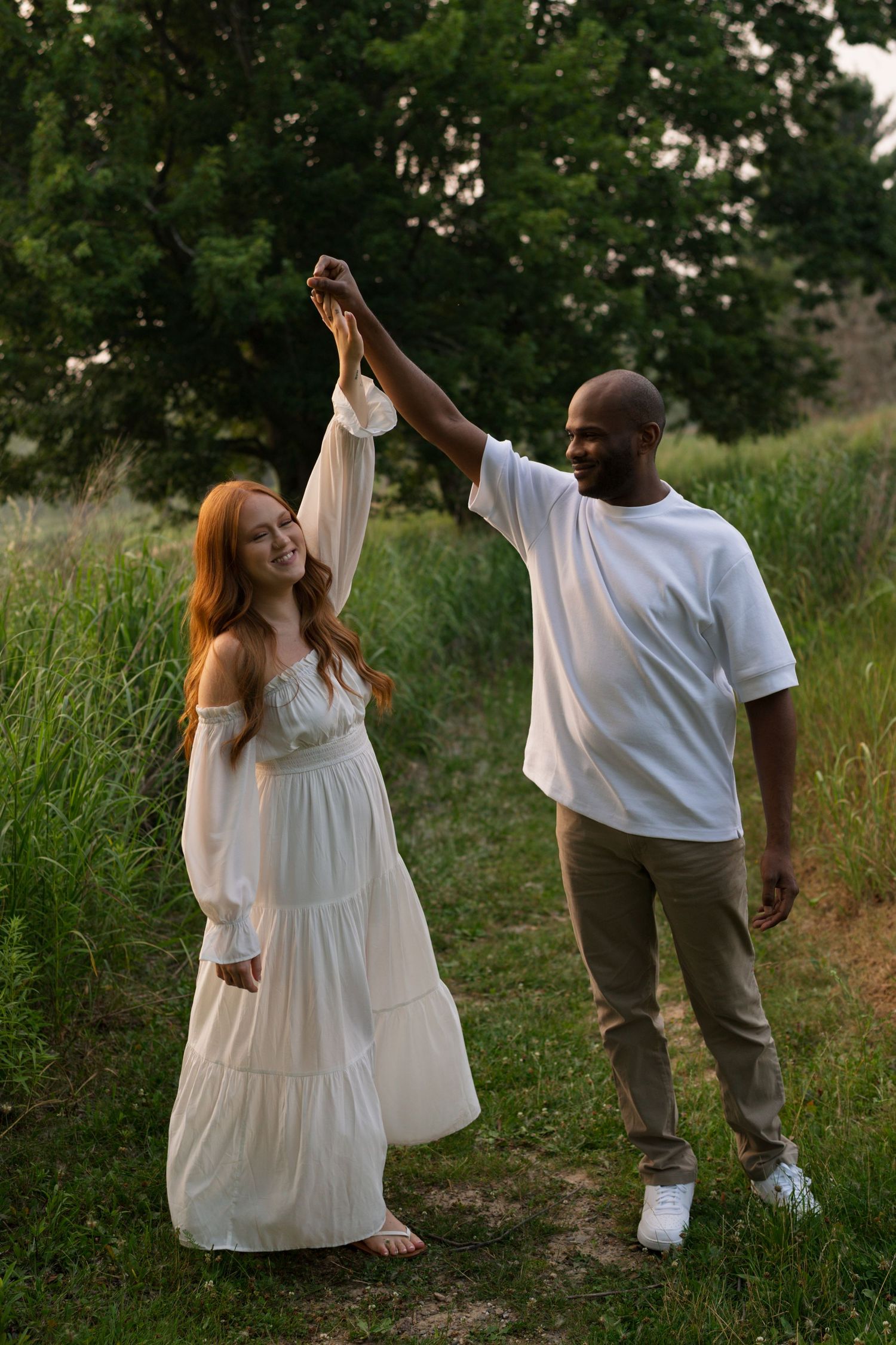 Expectant parents sharing a quiet moment together at Highlands Prairie.