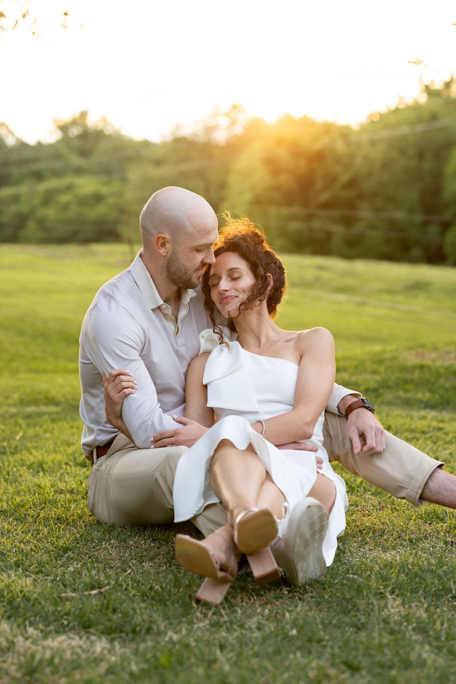 Couple sitting at Anne Springs Greenway for an engagement photo, photography by Natalie Wilson Photo, Fort Mill Photographer