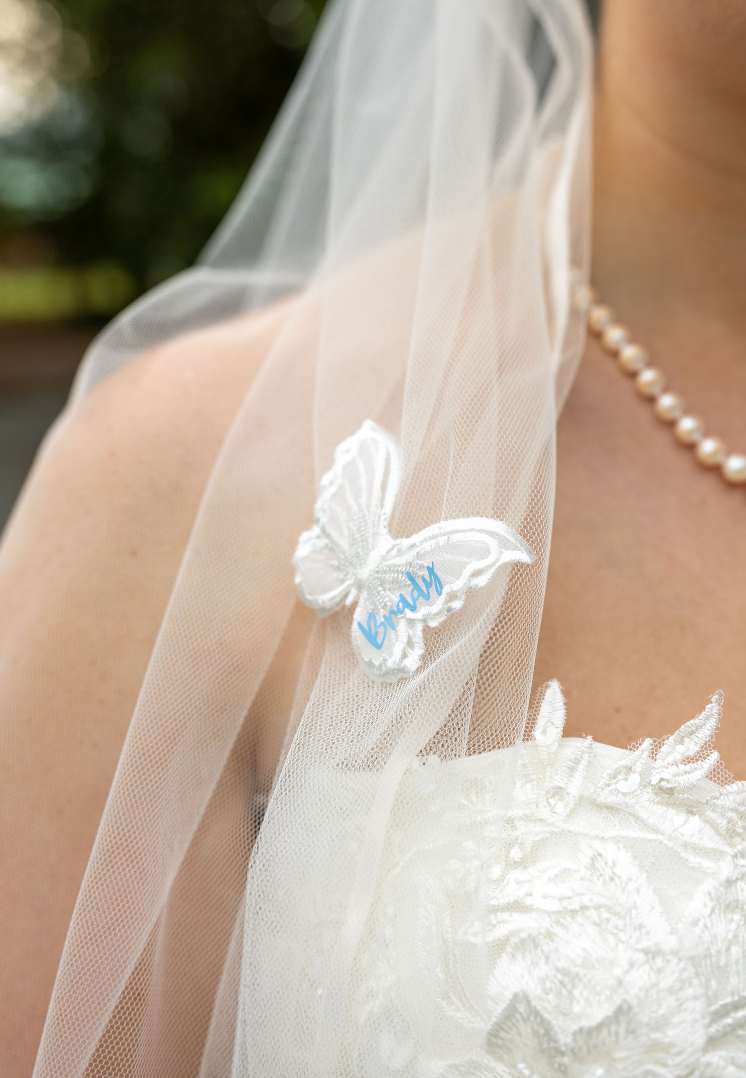 butterfly on brides veil, Photo at The Historic Robertson Homestead by Rock Hill Photographer, Natalie Wilson