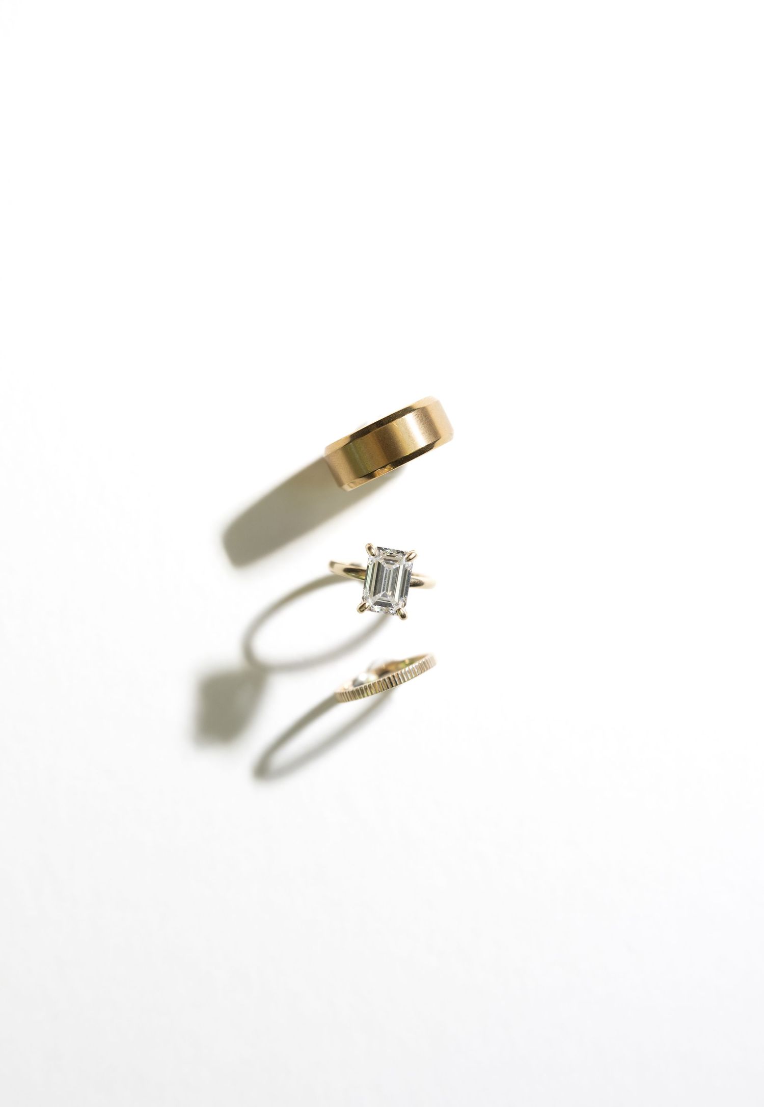 Artistic photo of wedding rings taken by Rock Hill Photographer, Natalie Wilson Photo