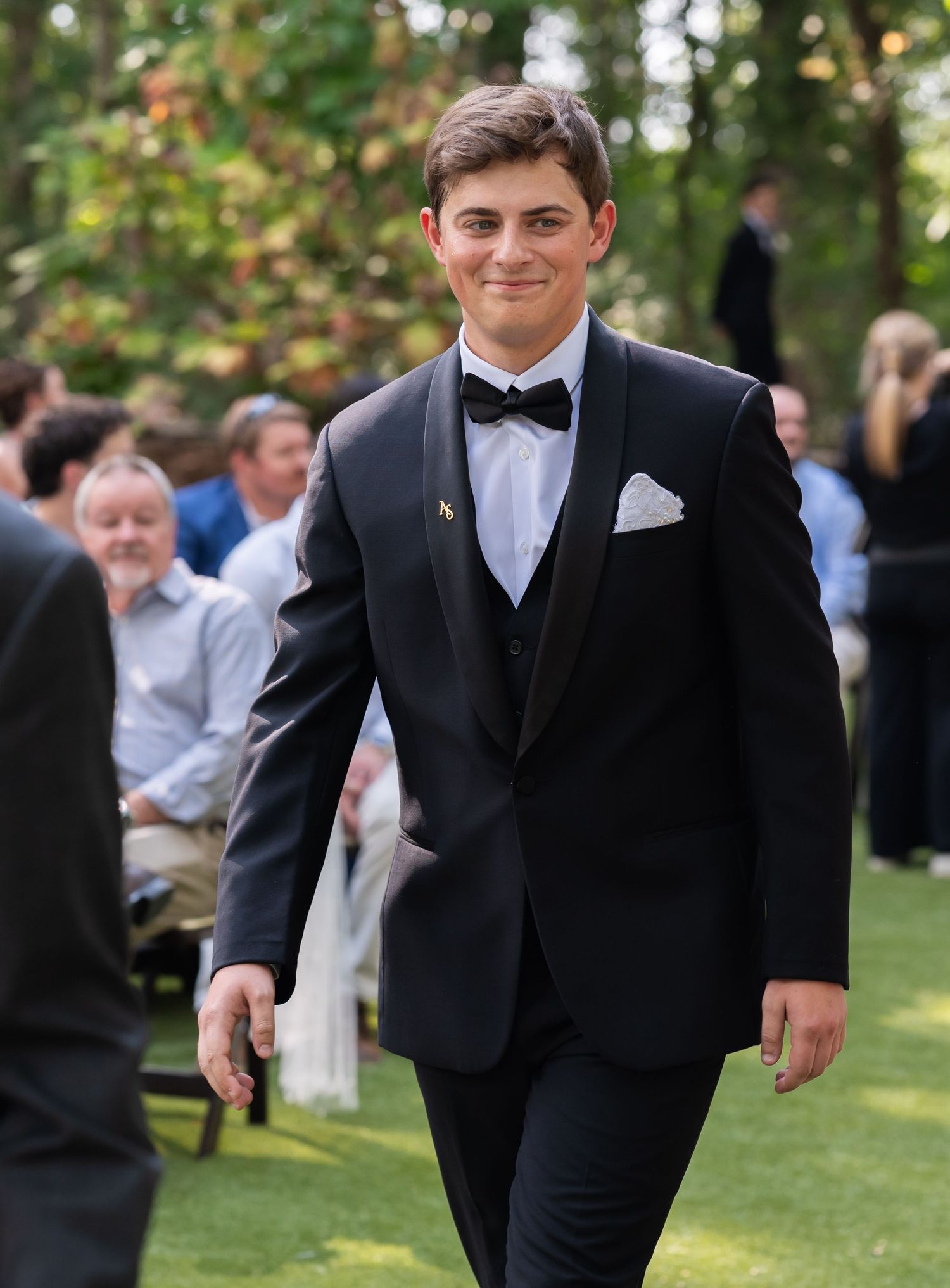 Photo of groom walking down the isle. Photo at The Historic Robertson Homestead by Rock Hill Photographer, Natalie Wilson