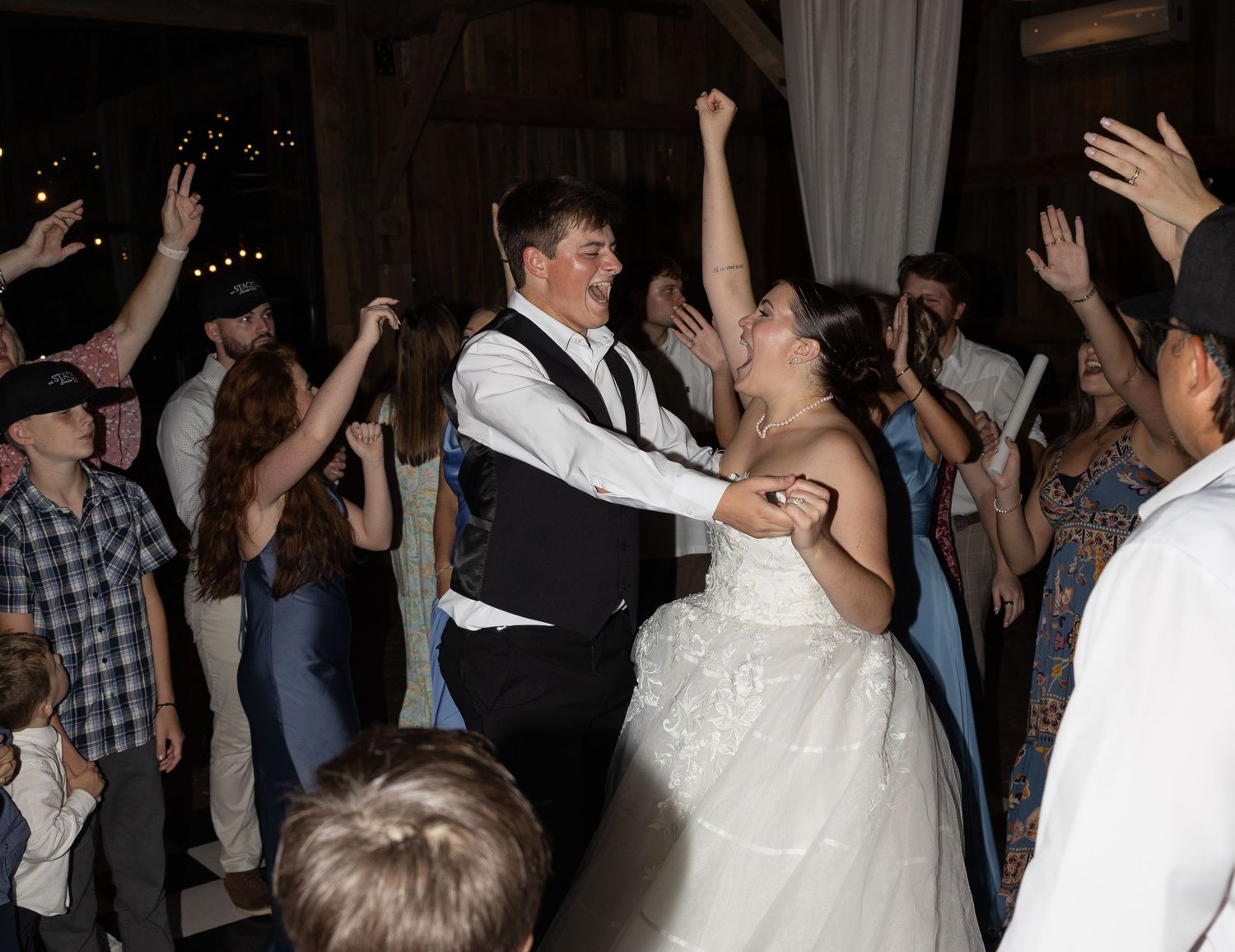 Bride and groom dancing at reception party. Photo at The Historic Robertson Homestead by Rock Hill Photographer, Natalie Wilson