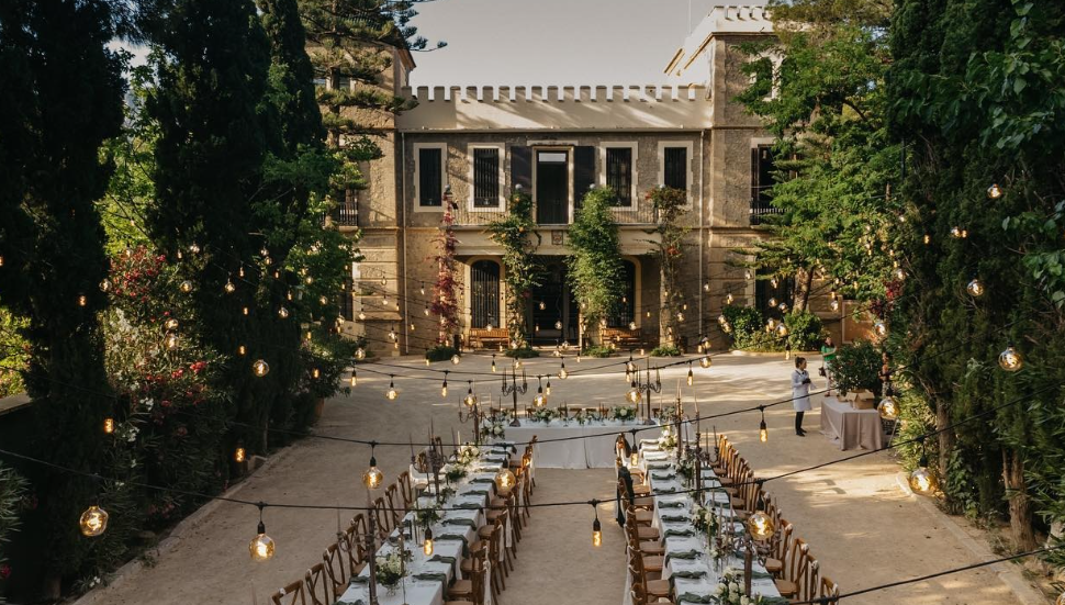 Elegant wedding table setting at a historic Spanish finca for a Mediterranean destination wedding