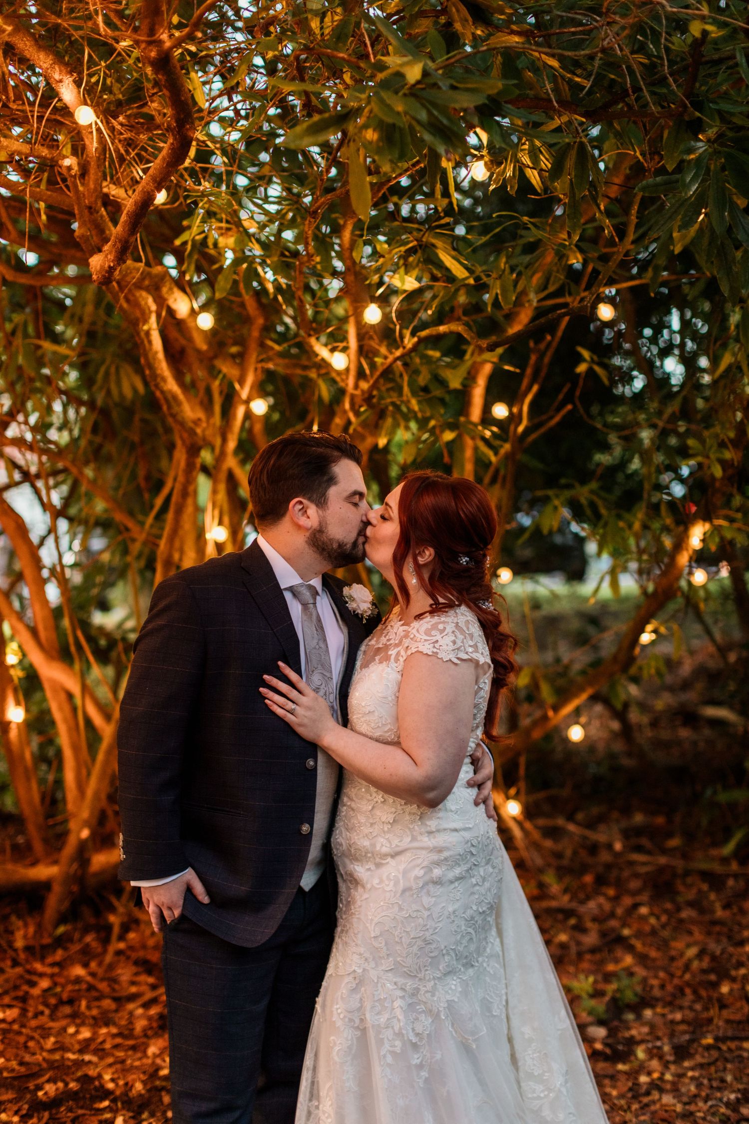 woodland kiss bride and groom forest