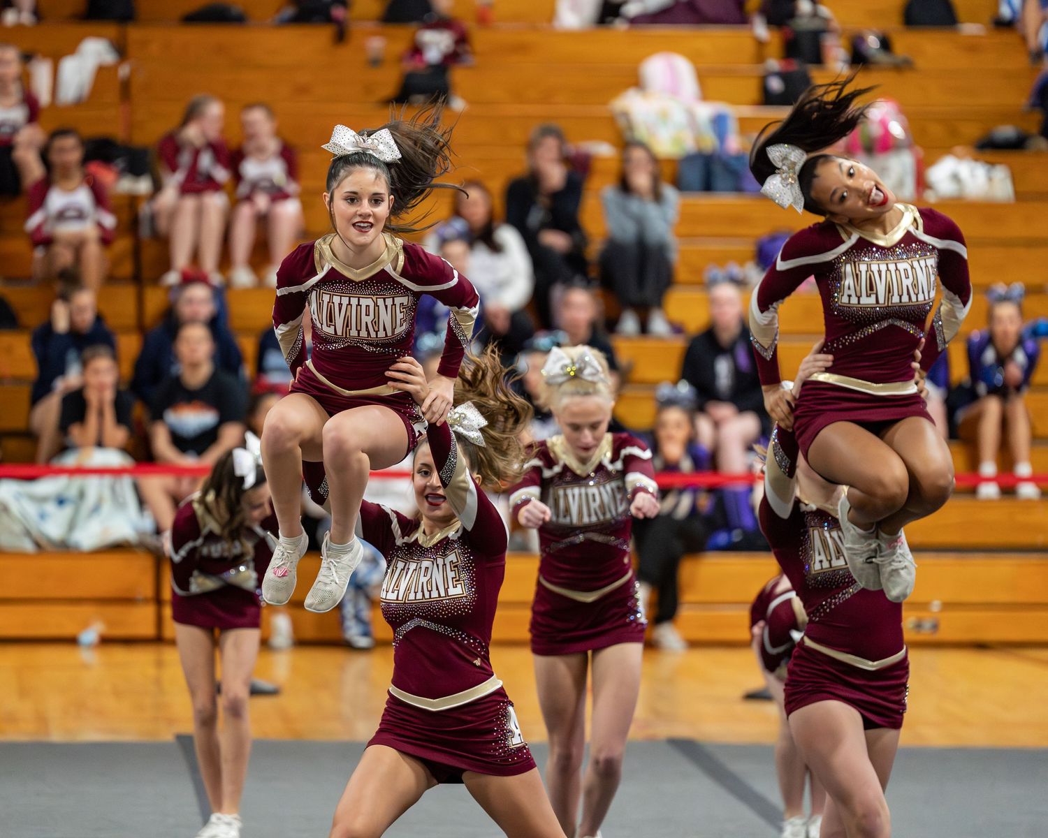 Fv3 Media Athlete Ambassador Indi Guilbeault - Cheerleader Captain for Alvirne High School cheering as a base at a NHIAA spirit competition