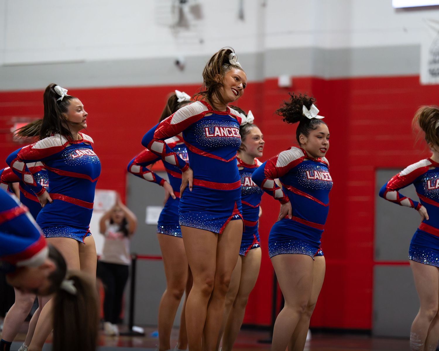 Fv3 Media Ambassador Sayde Thompson - Cheerleader Captain for Londonderry High School cheering as a base at a NHIAA spirit competition