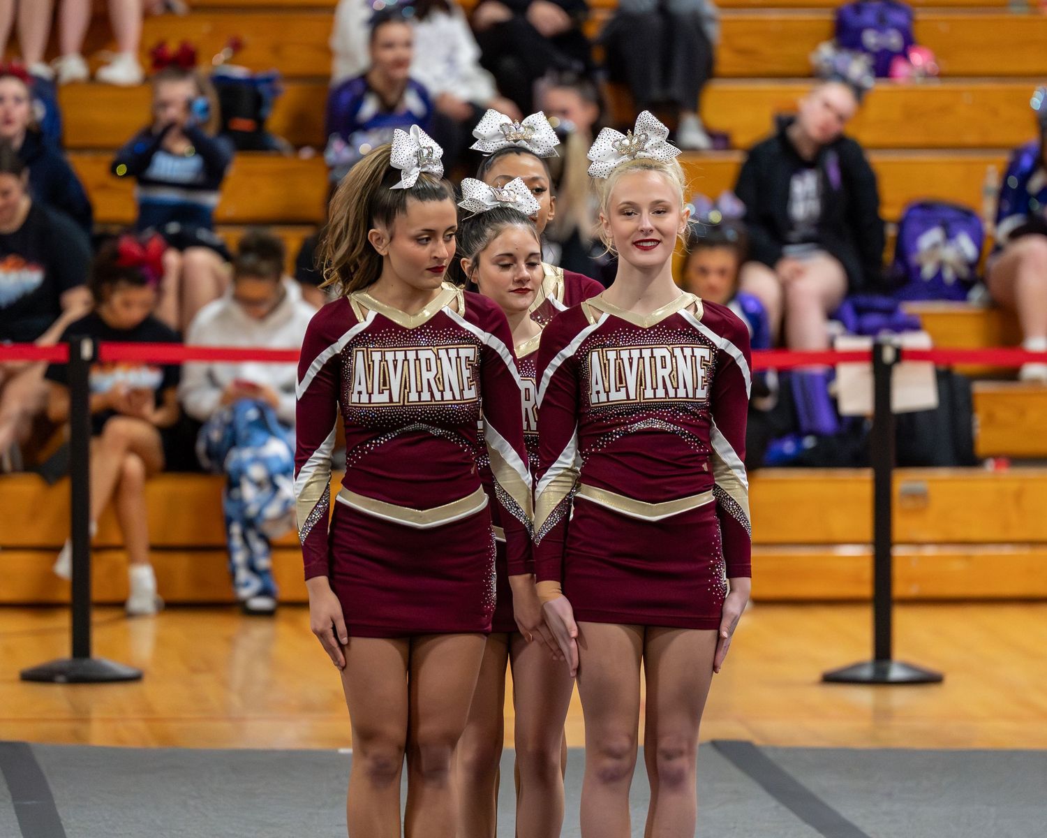 Fv3 Media Athlete Ambassador Indi Guilbeault - Cheerleader Captain for Alvirne High School cheering as a base at a NHIAA spirit competition