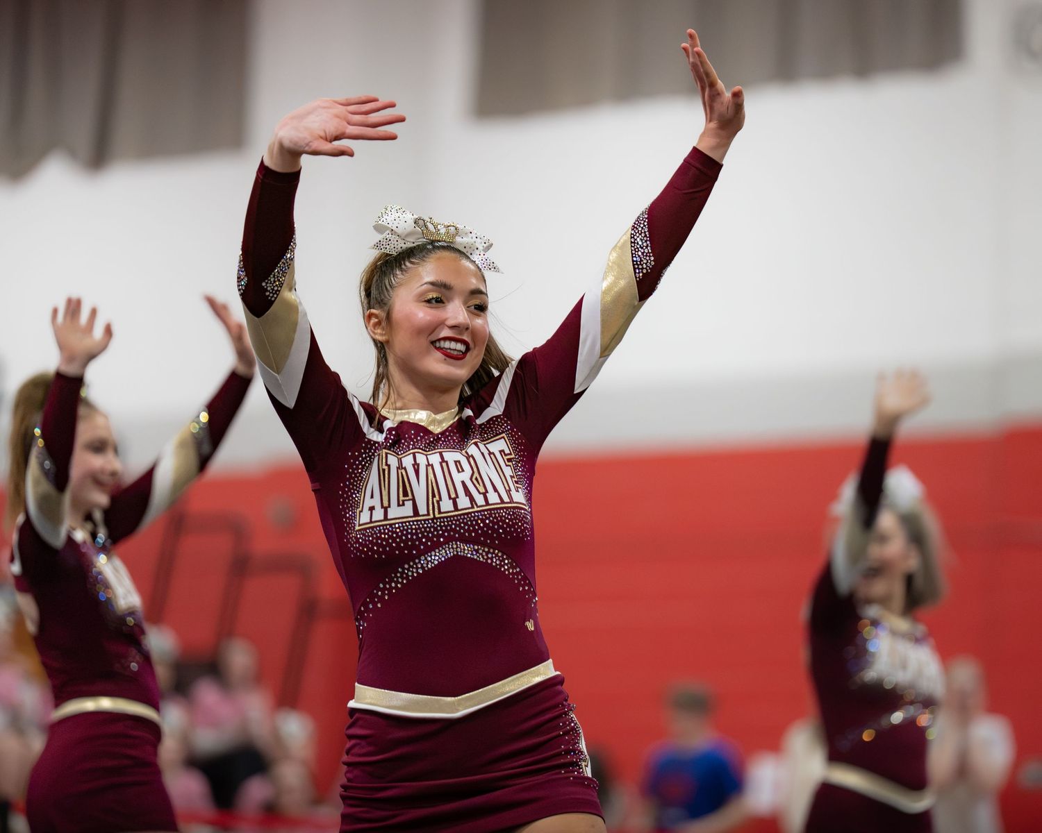 Fv3 Media Athlete Ambassador Abby Labonte - Cheerleader Captain for Alvirne High School cheering as a base at a NHIAA spirit competition